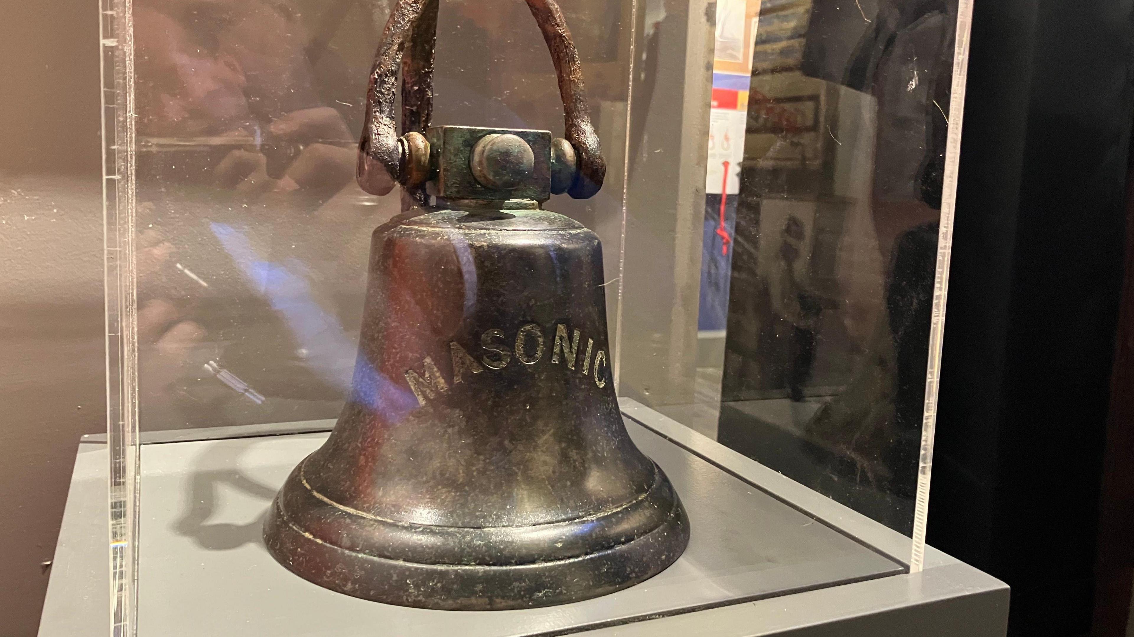 A general view of the bell from The Masonic inside a display case at Brightlingsea Museum
