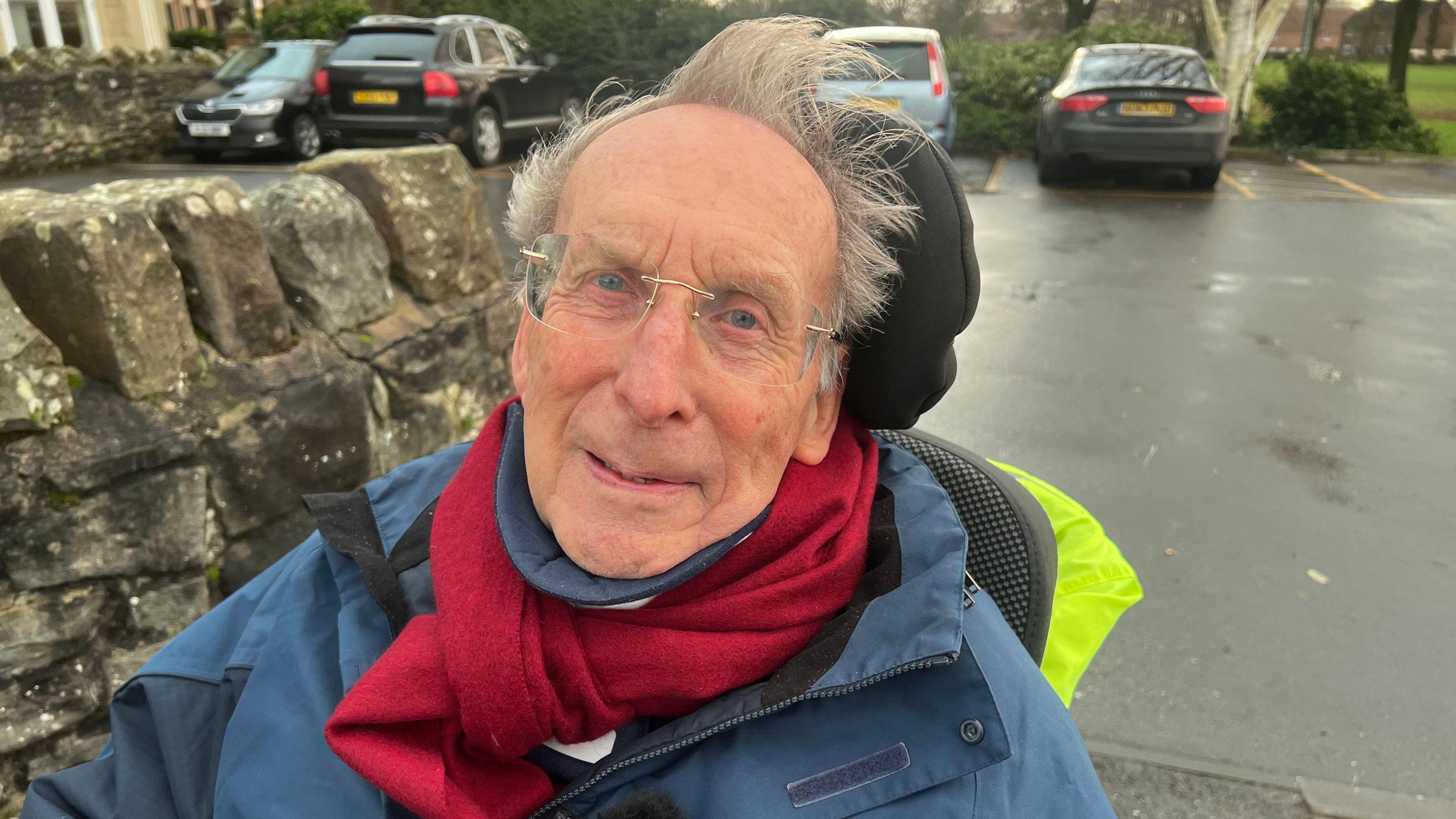 Brian Clarke, who has motor neurone disease, in his wheelchair in Wells.