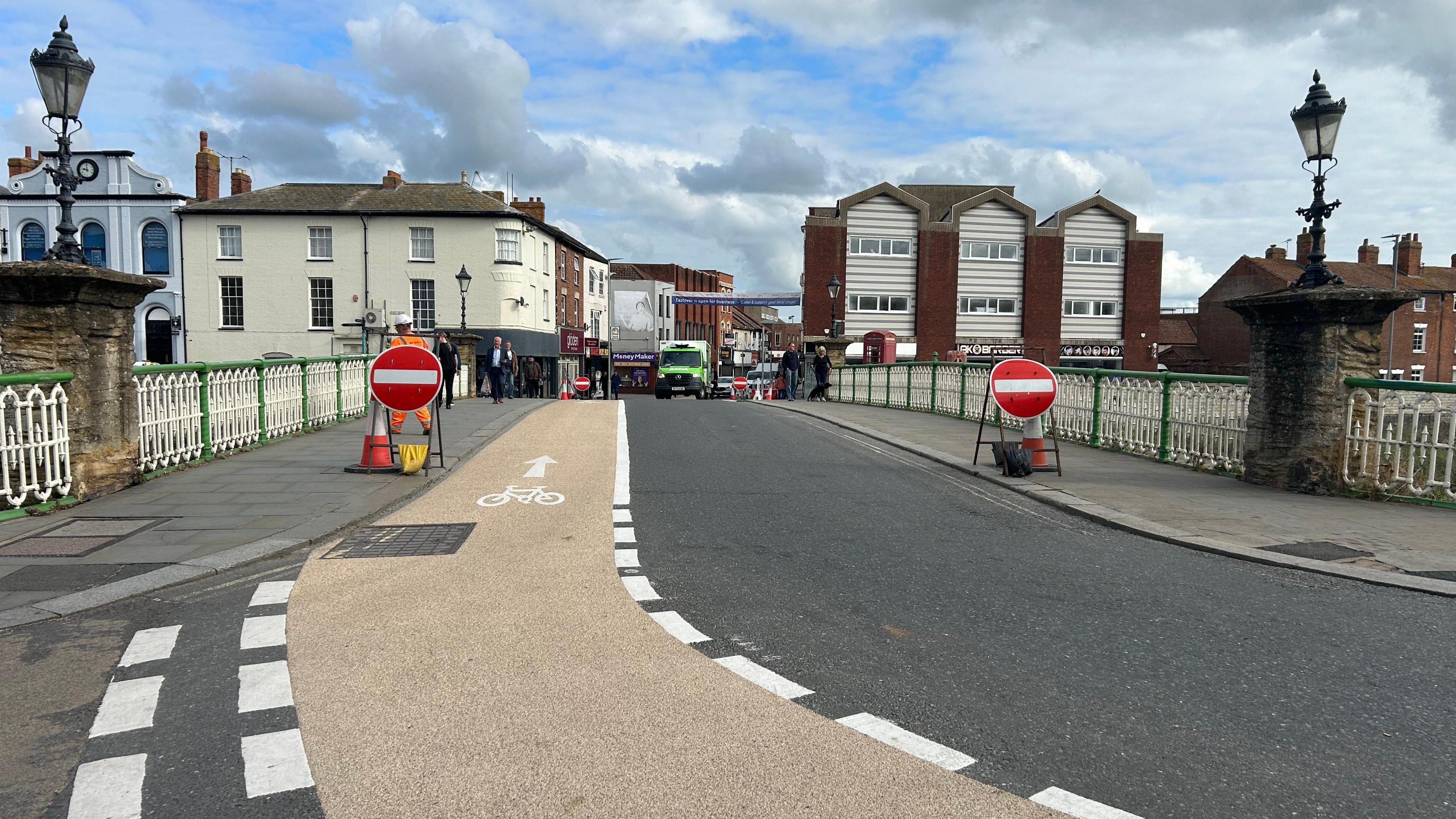 The road heading across the bridge to Eastover, East Quay and Salmon Parade, with a red no-entry signs flanking the road.