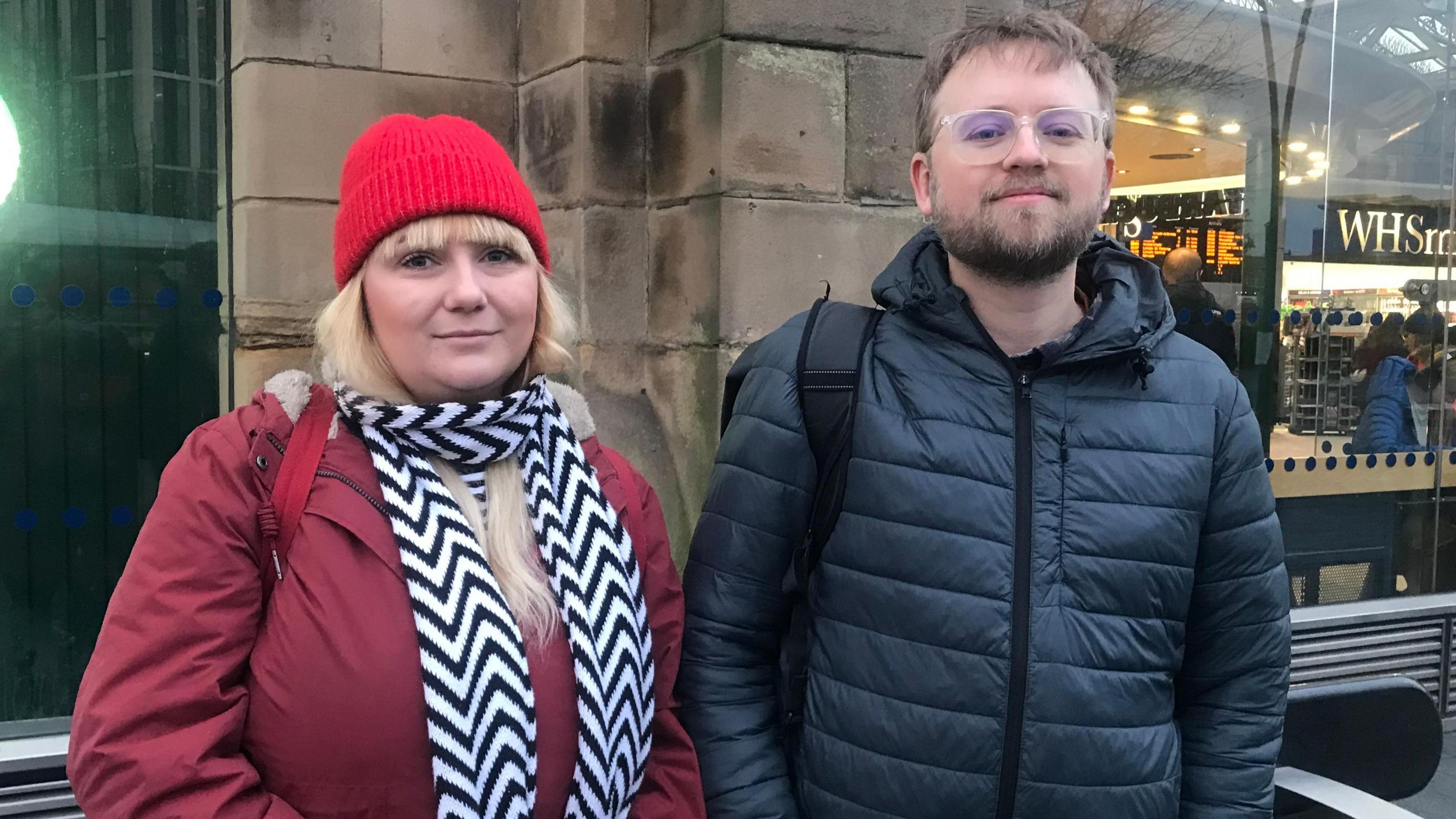 The pair stand in front of Sheffield train station, wrapped in winter coats. Ms Fitt-Stirling is wearing a black and white scarf and red hat, while Mr Partridge is wearing glasses.