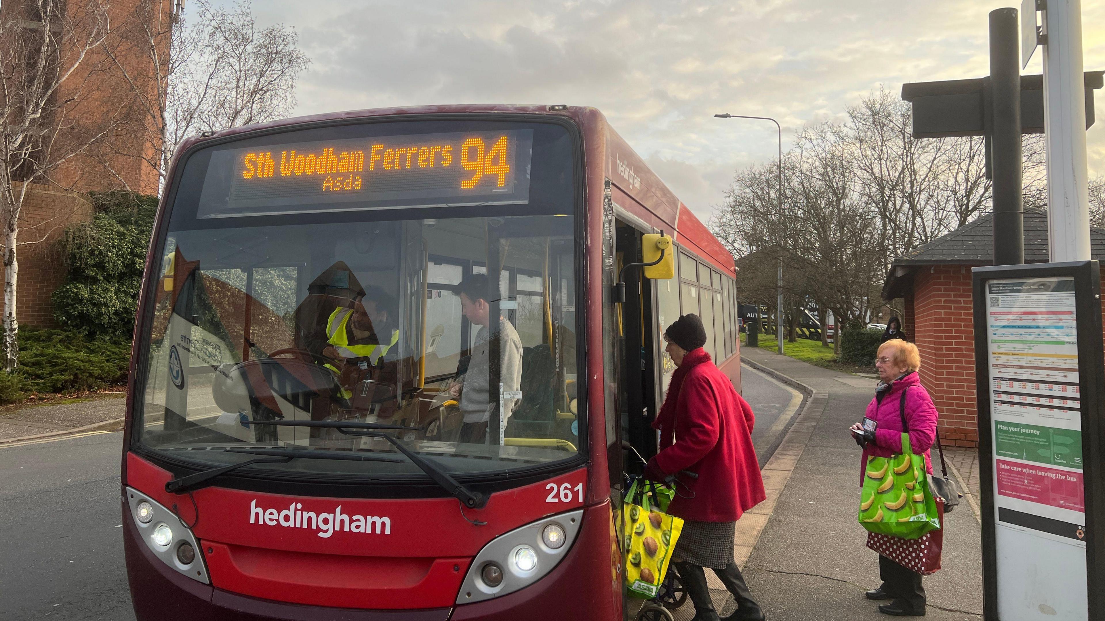 Three people getting on the 94 bus to South Woodham Ferrers