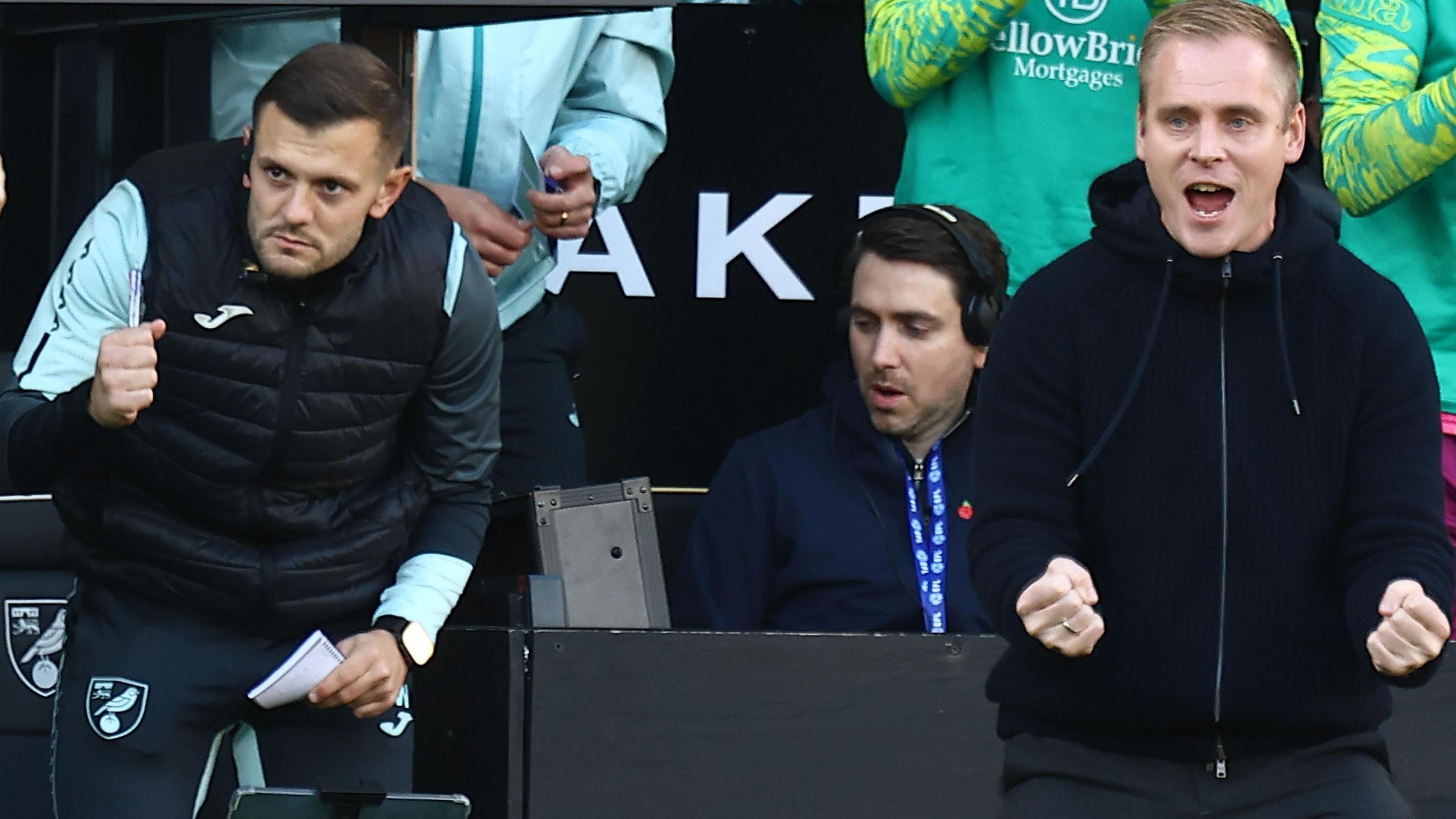 Jack Wilshere and Norwich head coach Johannes Hoff Thorup celebrate with fists clenched following a goal against Middlesbrough