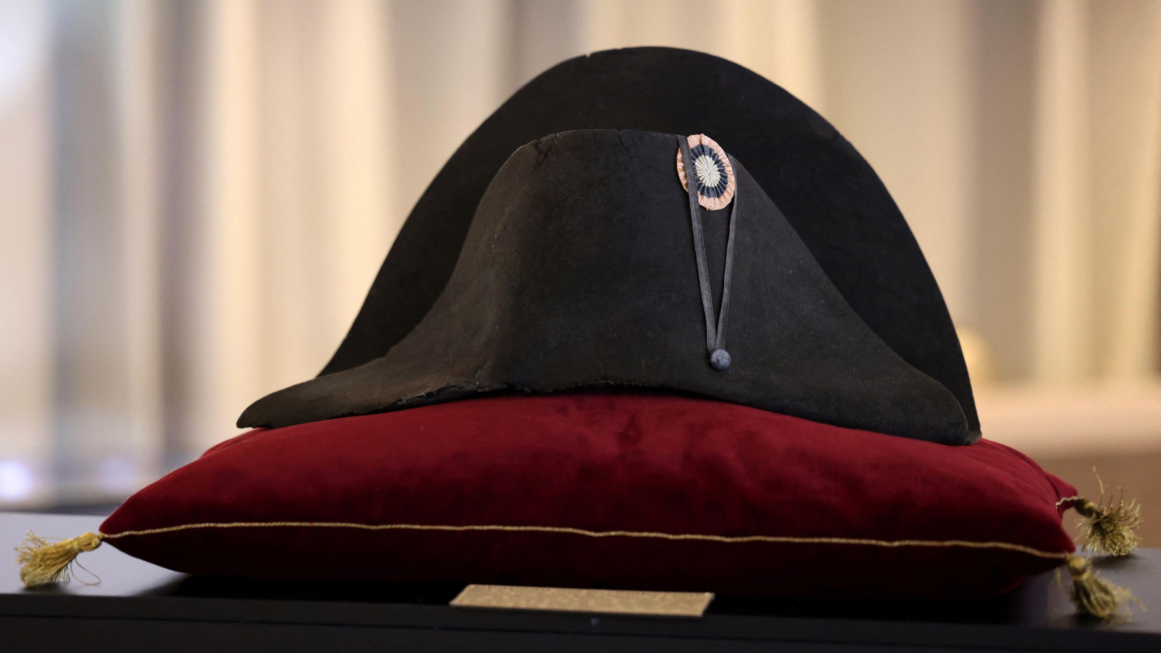 A "black beaver" felt two-cornered hat with an embroidered tricolor cockade belonging to French Emperor Napoleon Bonaparte.