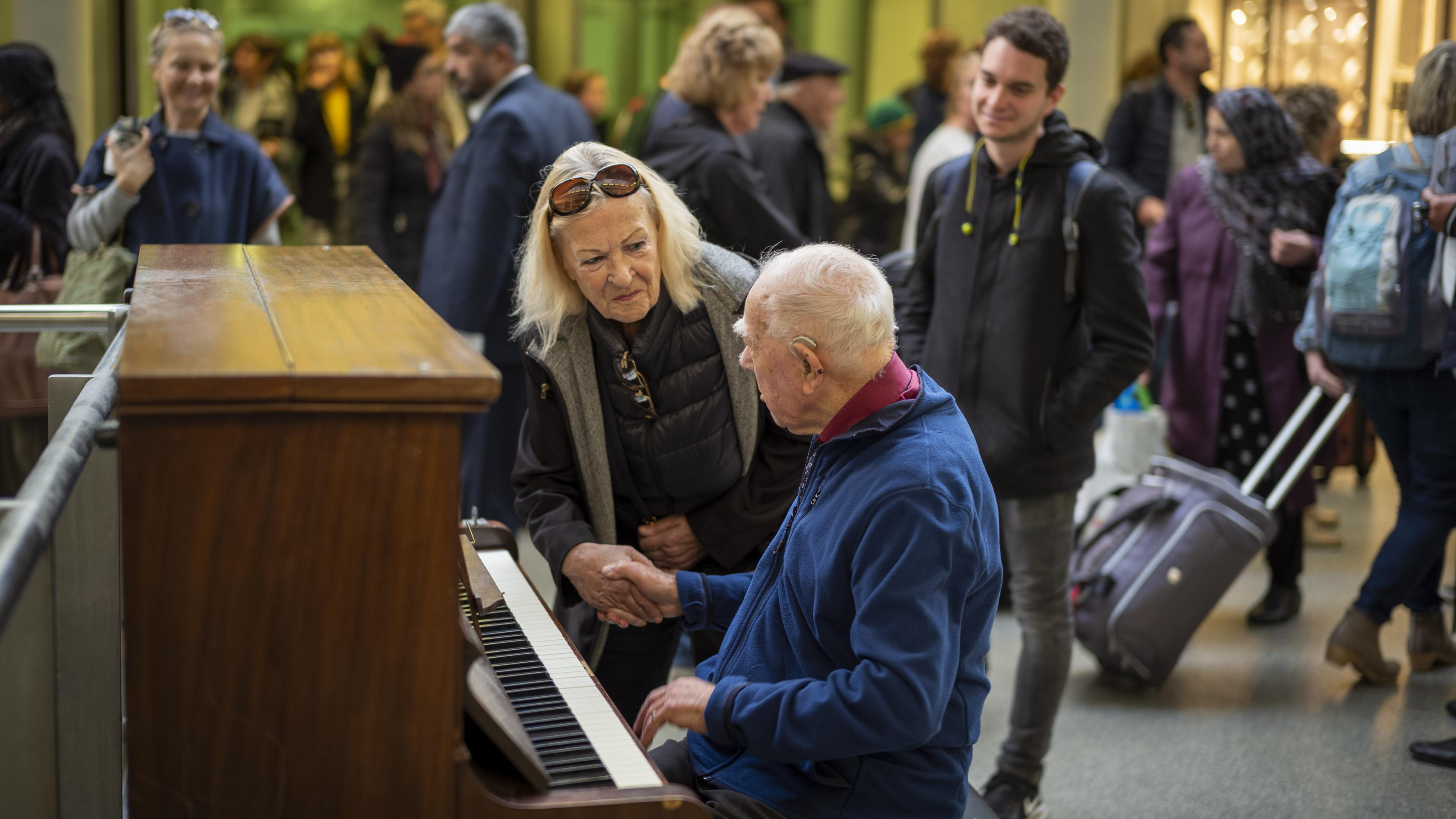 Denis Robinson plays at St Pancras station