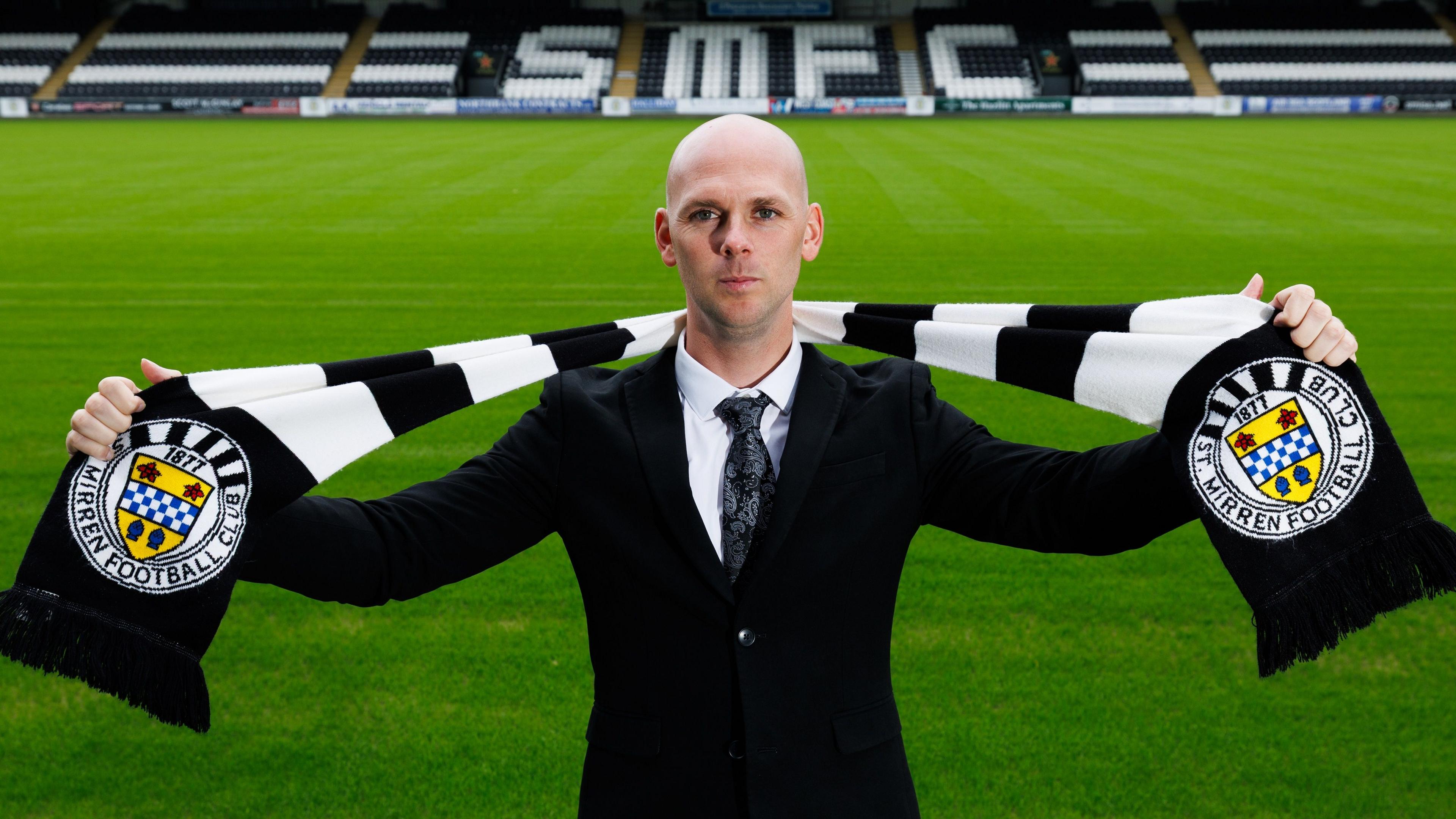 Craig McLeish poses with a St Mirren scarf