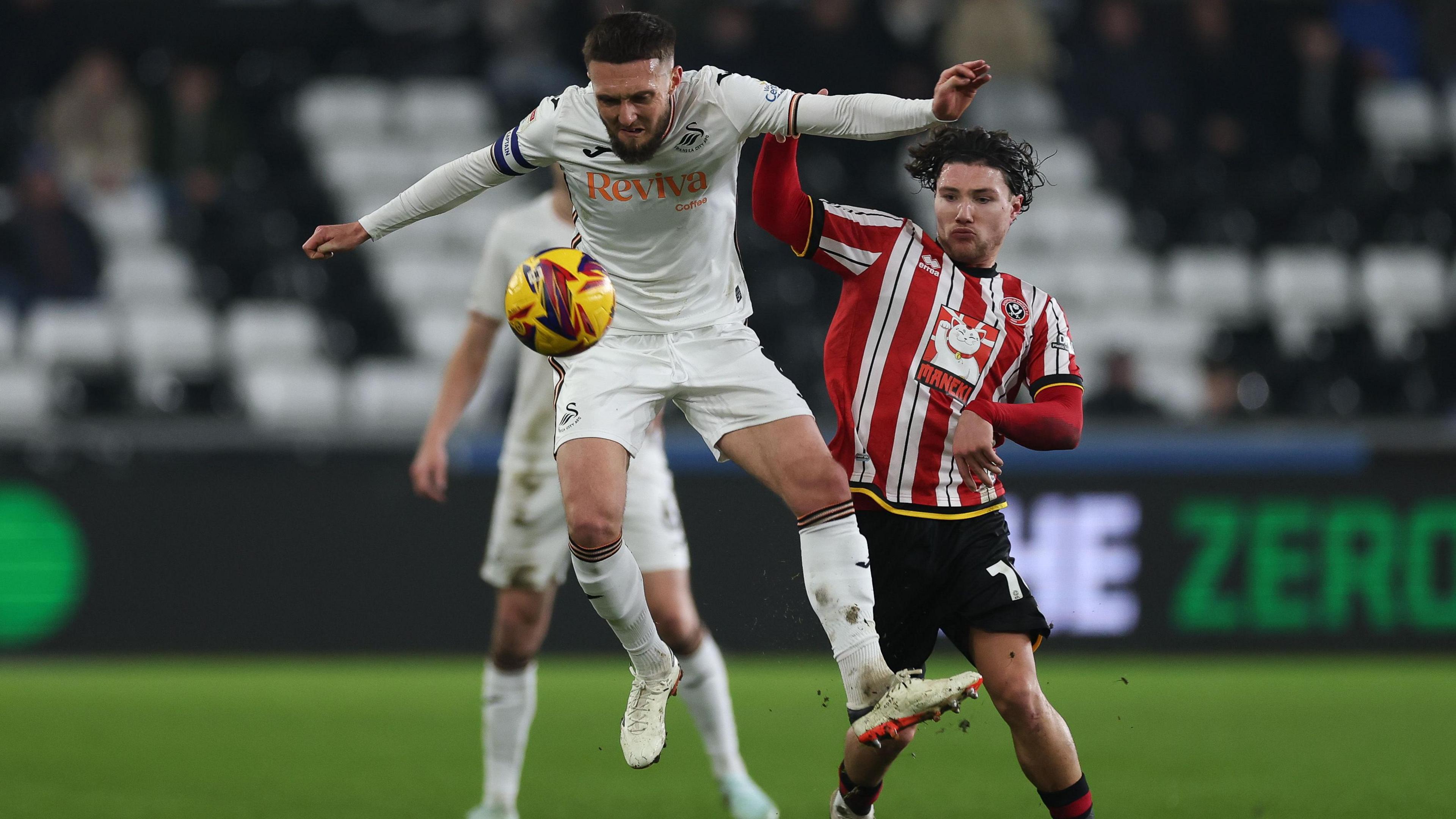 Matt Grimes controls the ball