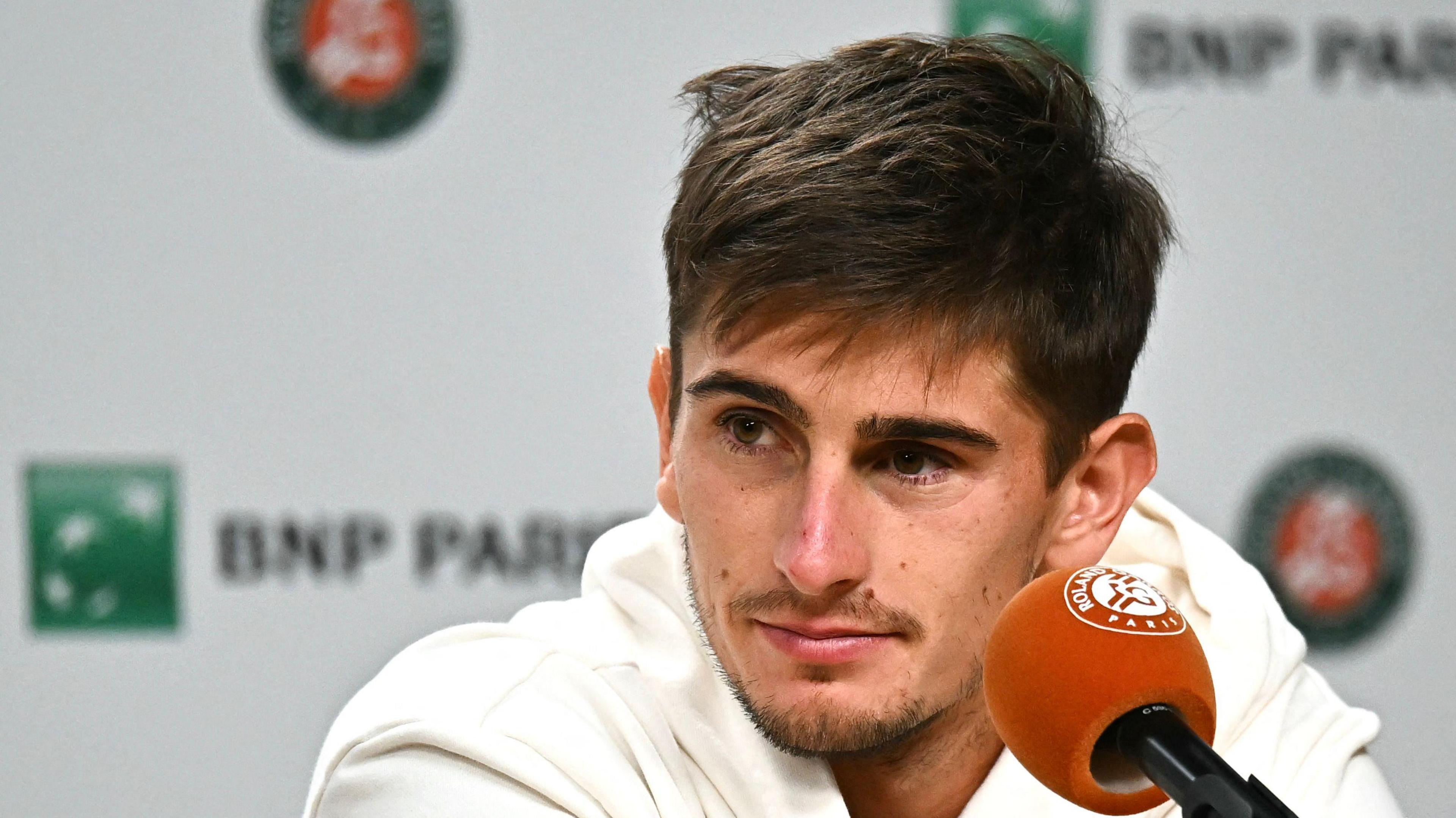 Matteo Arnaldi looks rueful
