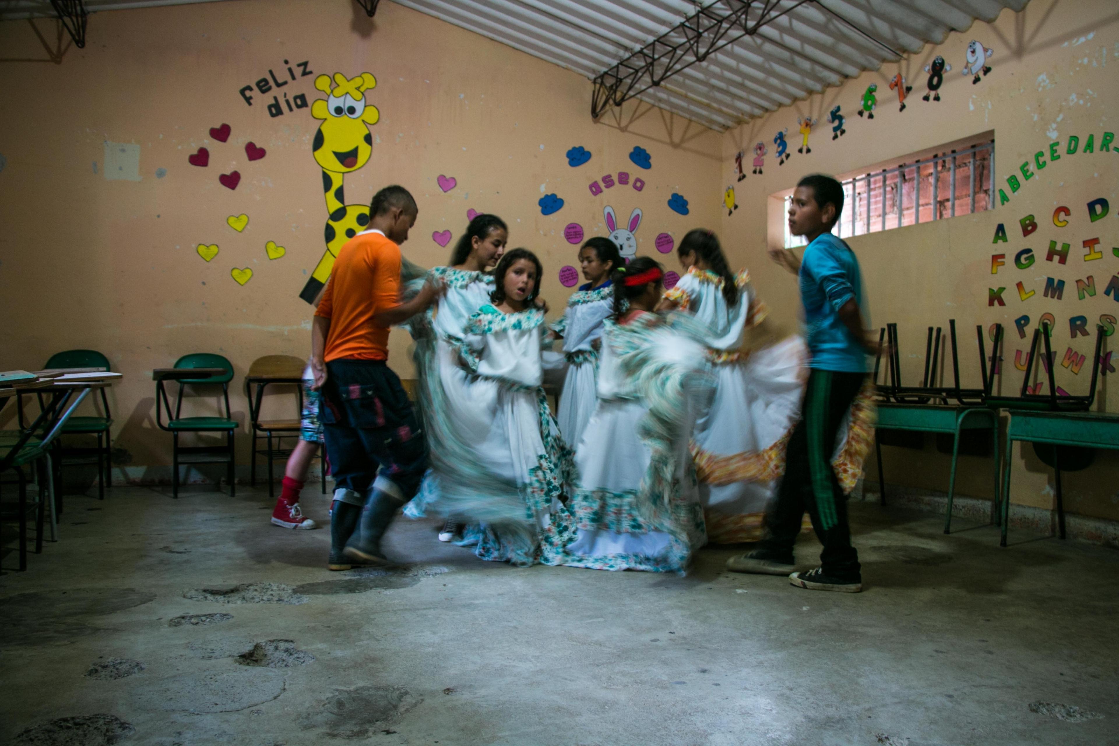 Children practice a cultural dance in Santa Lucia’s school, July 2016