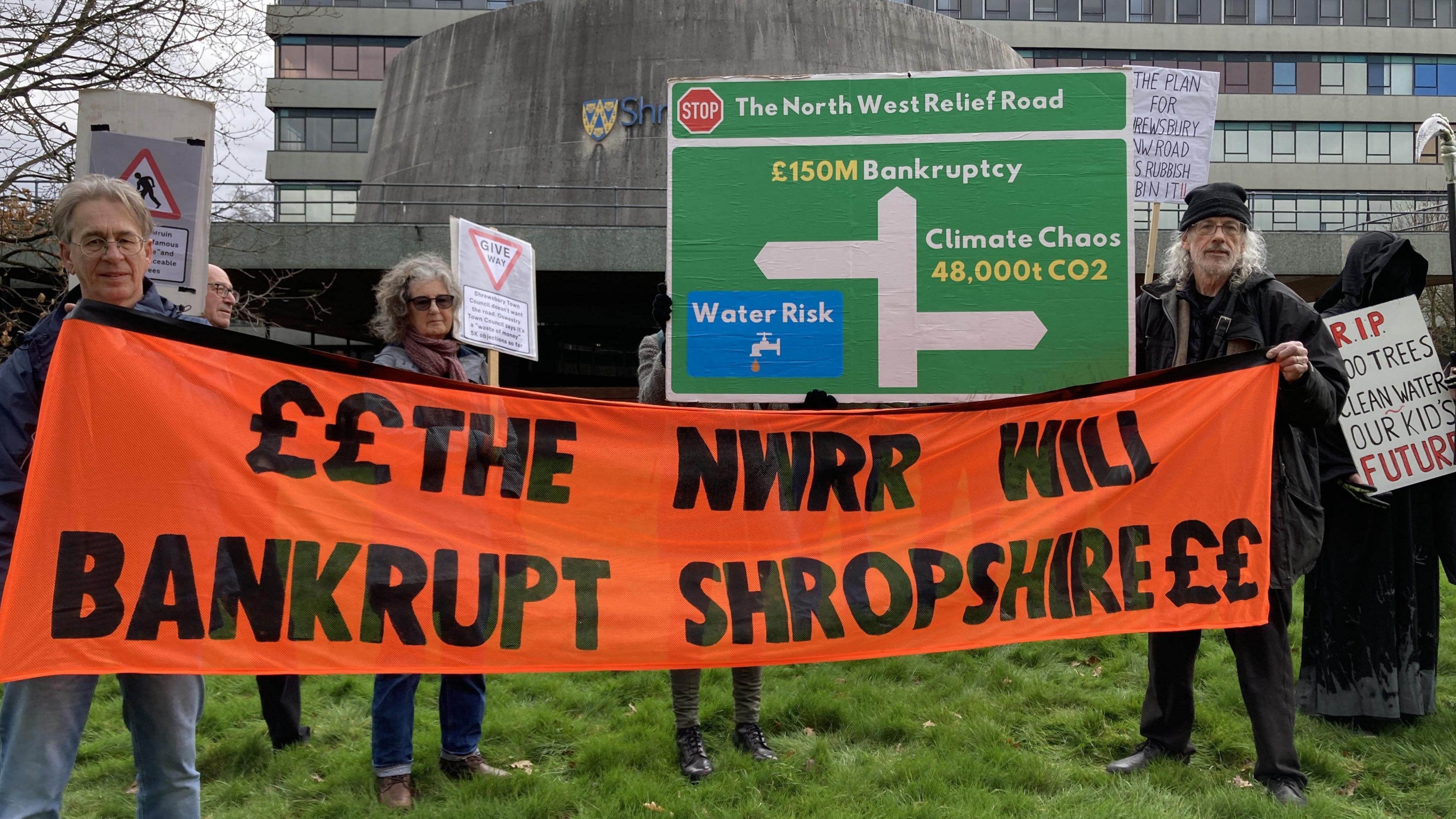 Protestors with a banner