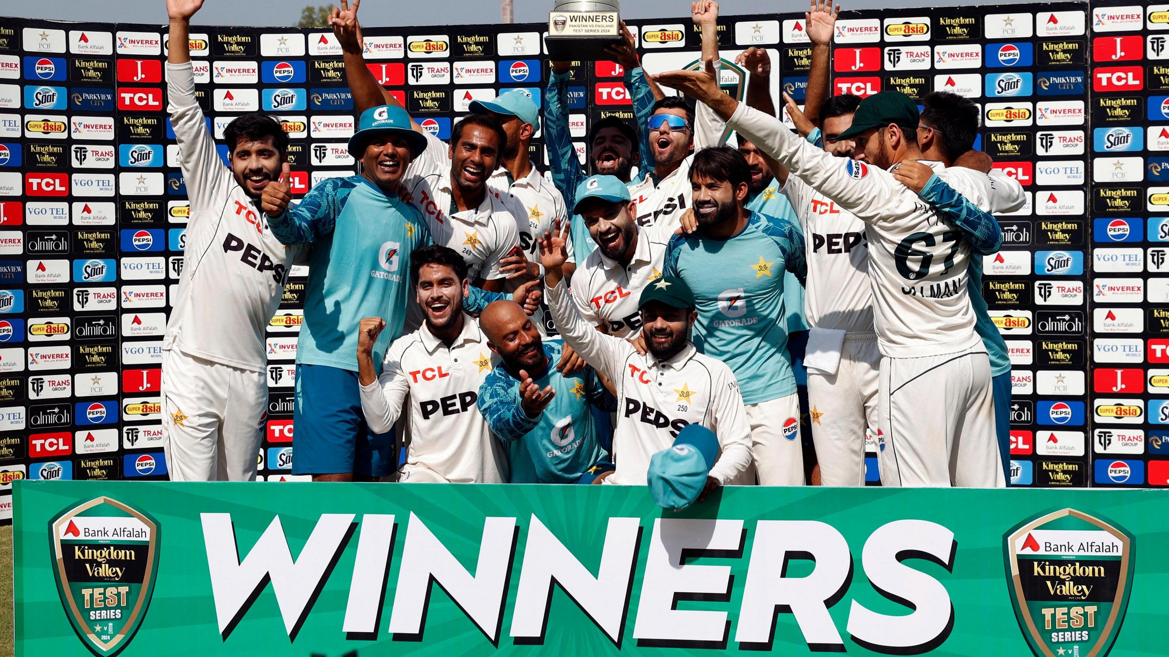 Pakistan celebrate with the trophy after winning the Test series