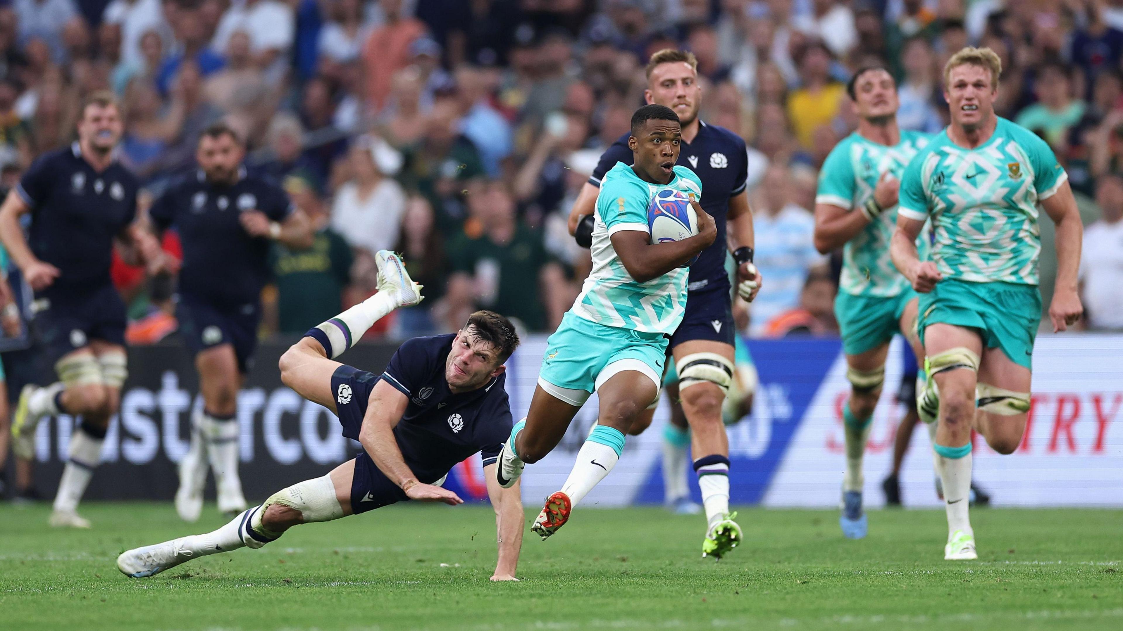 Grant Williams races away from the Scotland defence at the 2023 World Cup