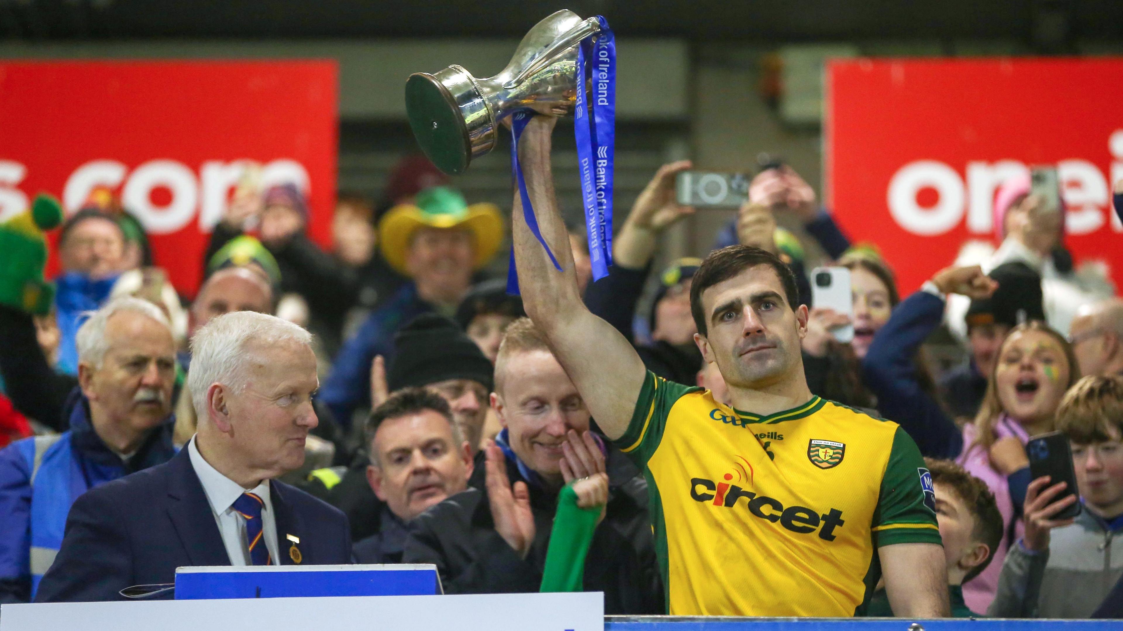 Caolan McGonagle lifts the Dr. McKenna Cup