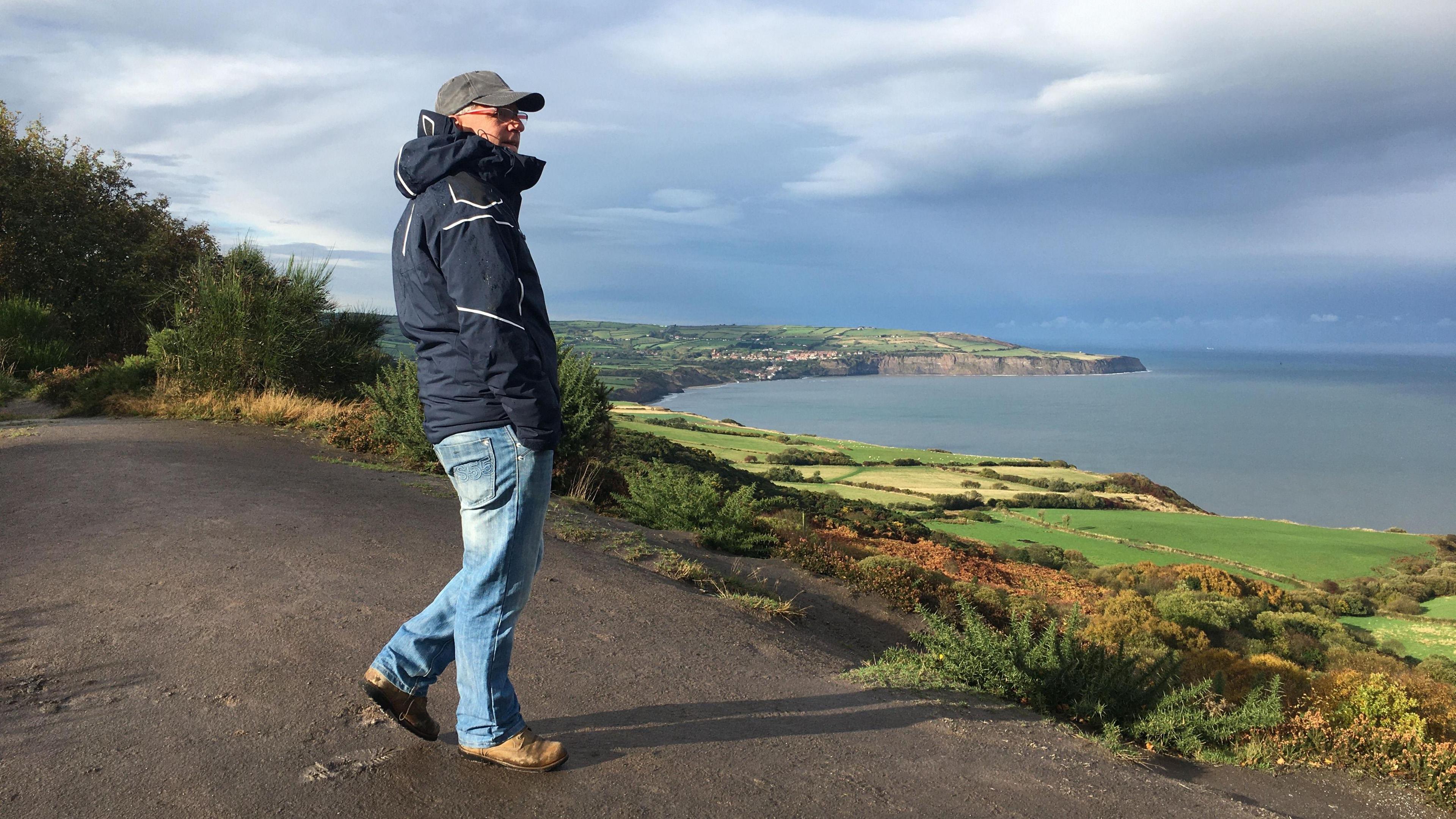 Man looking out to sea