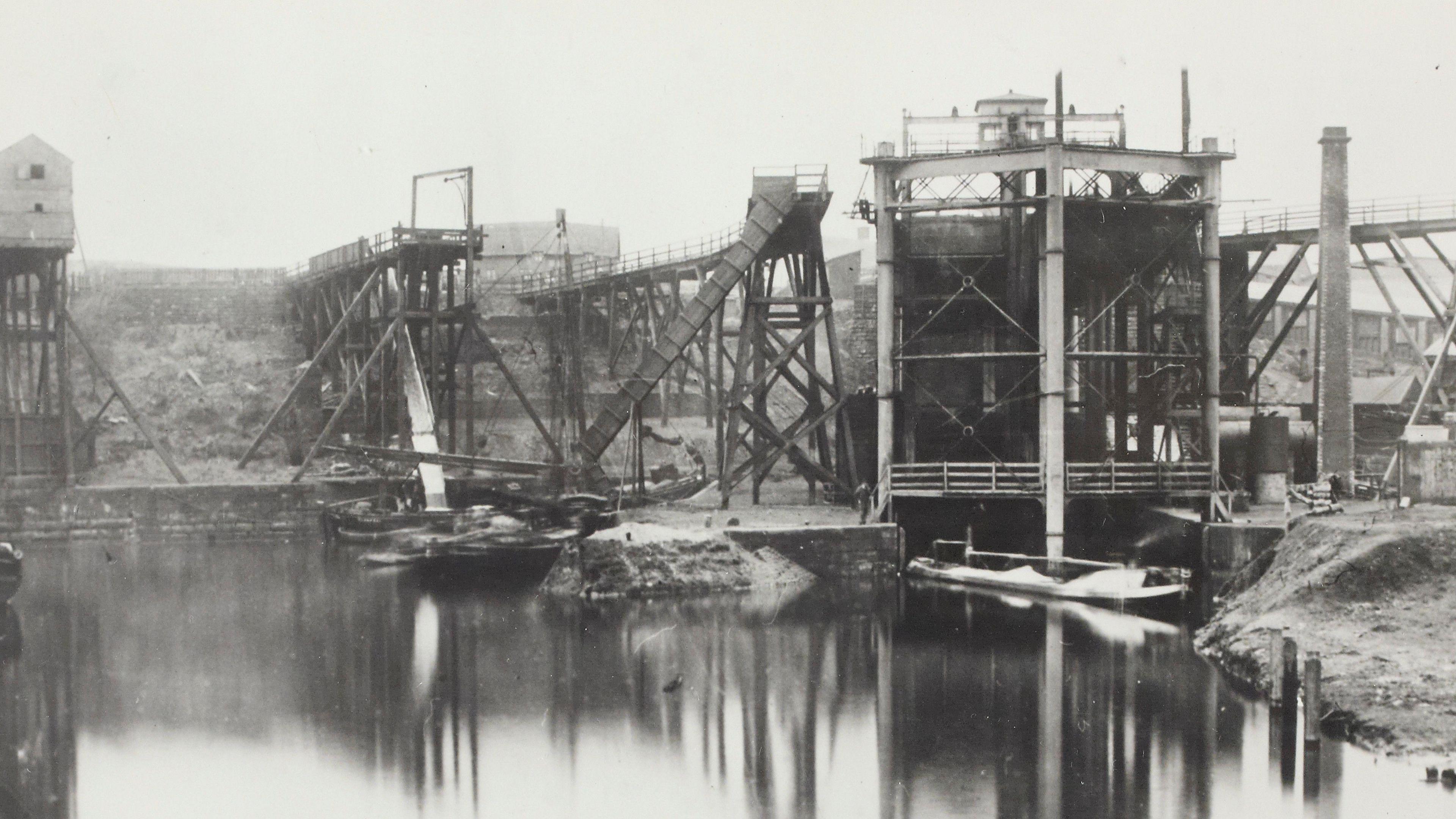 A view of the Anderton Boat Lift under construction. Chutes were used to move goods from one to the other
