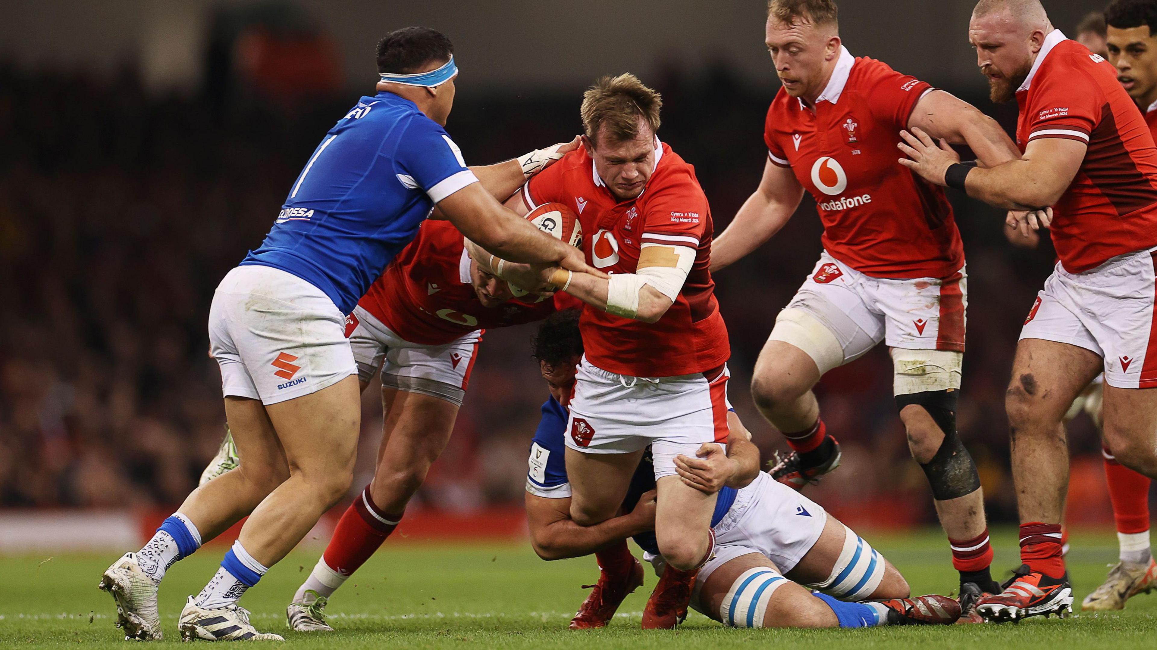 Nick Tompkins playing for Wales