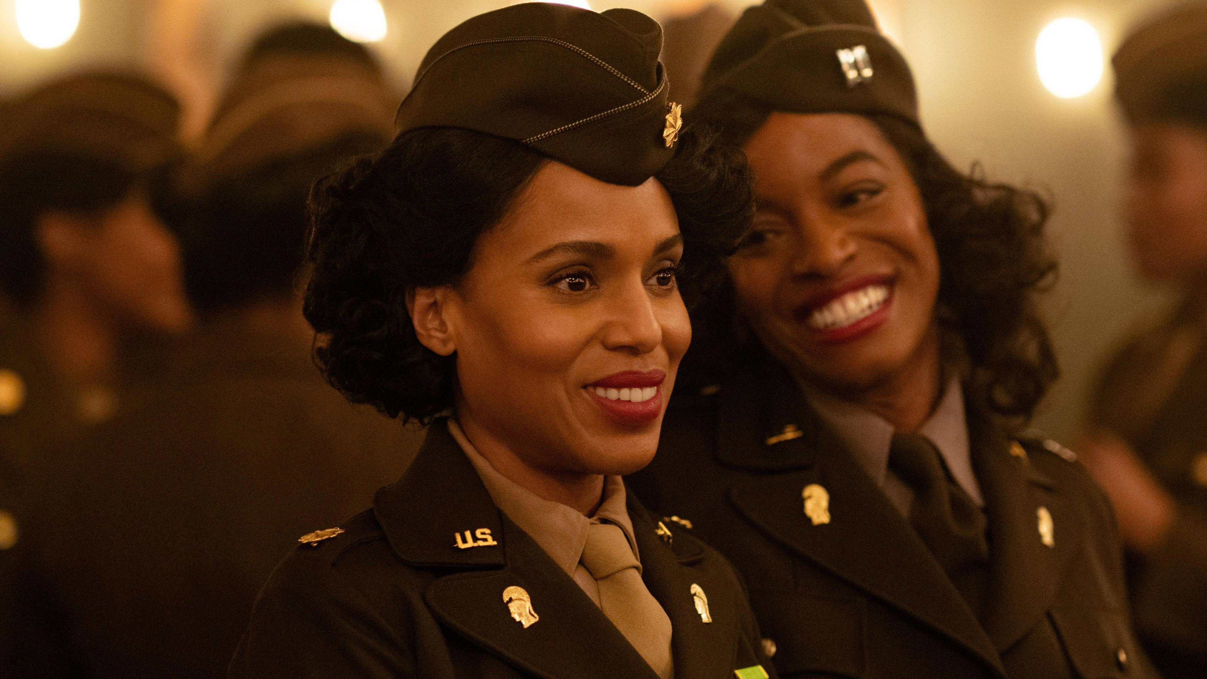 Actress Kerry Washington is seen smiling on the set of the Six Triple Eight Film flanked by another actress