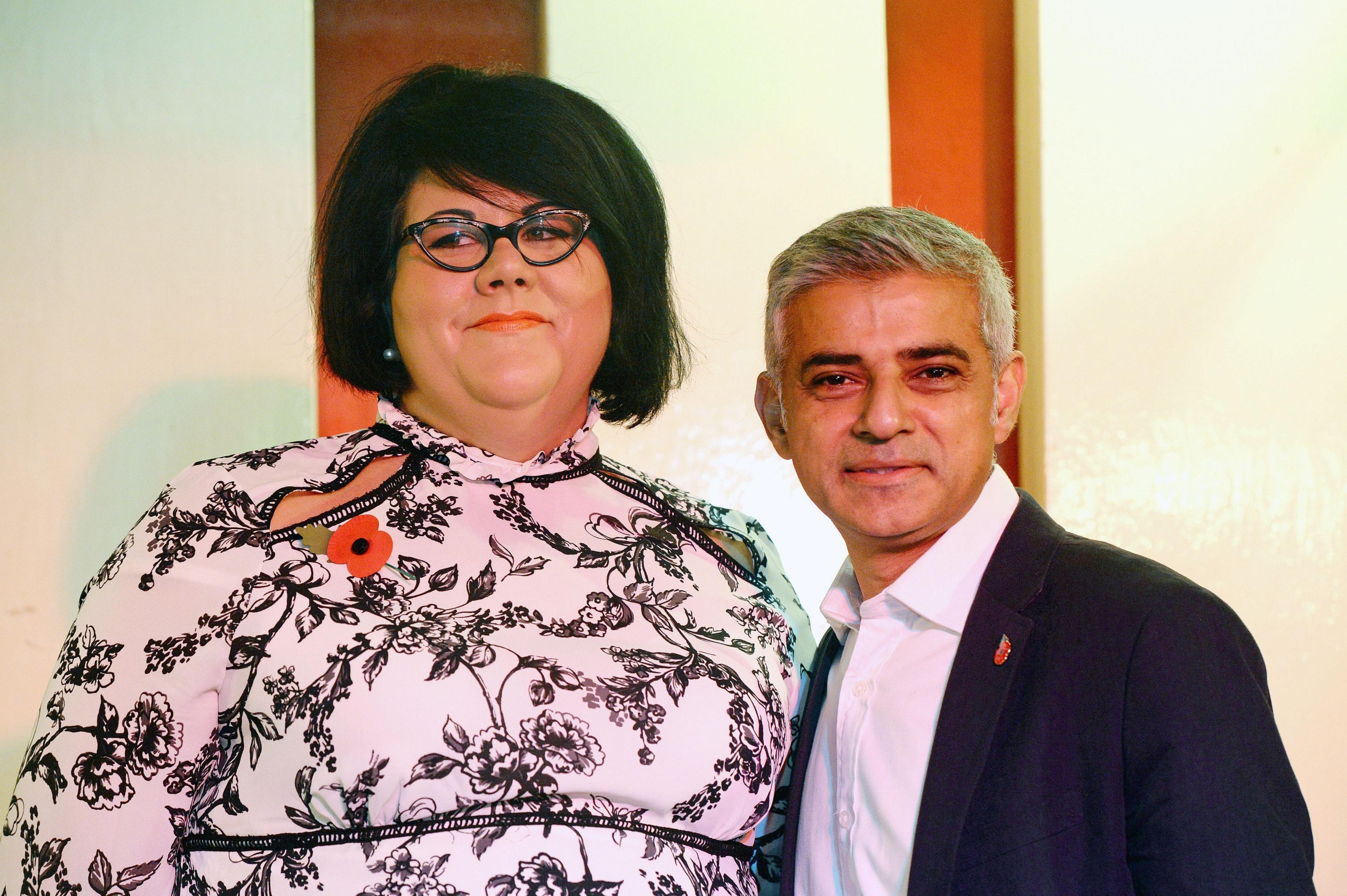 Amy Lamé and Sadiq Khan smile to camera