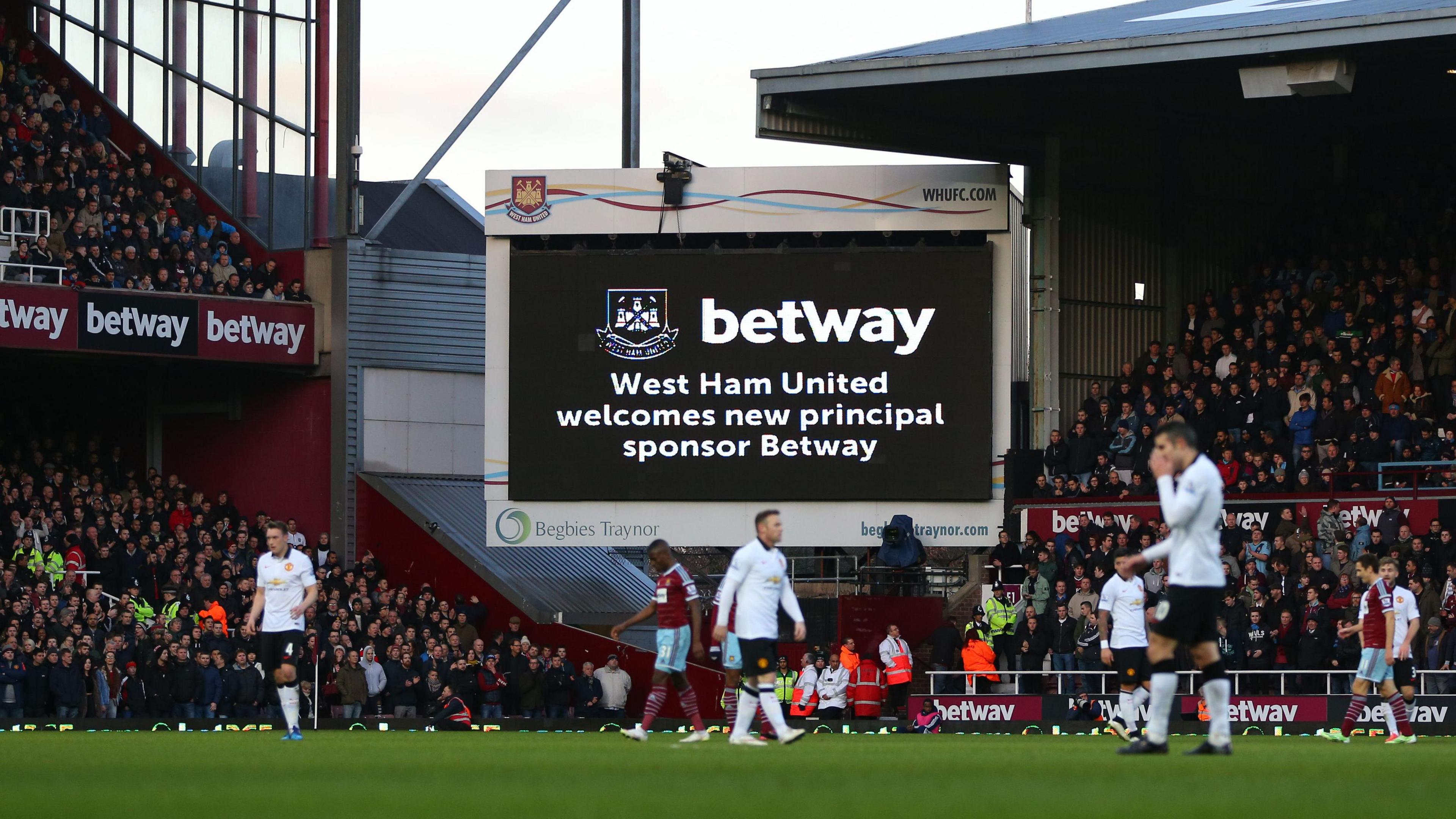 The big screen at the Boleyn Ground stadium in east London with a message welcoming the new sponsor Betway during a match between West Ham United at home and Manchester United