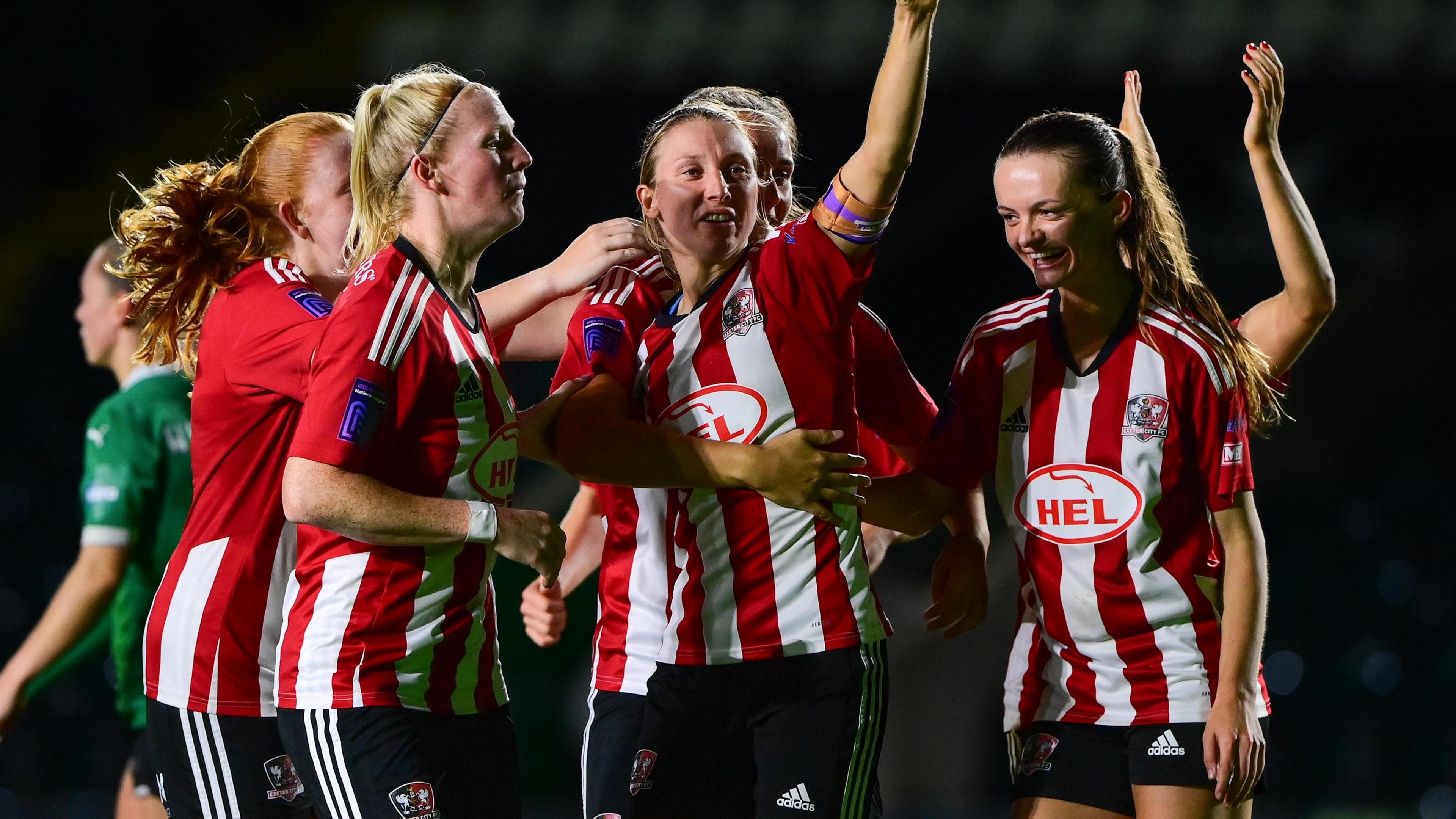 Exeter City women celebrate a goal