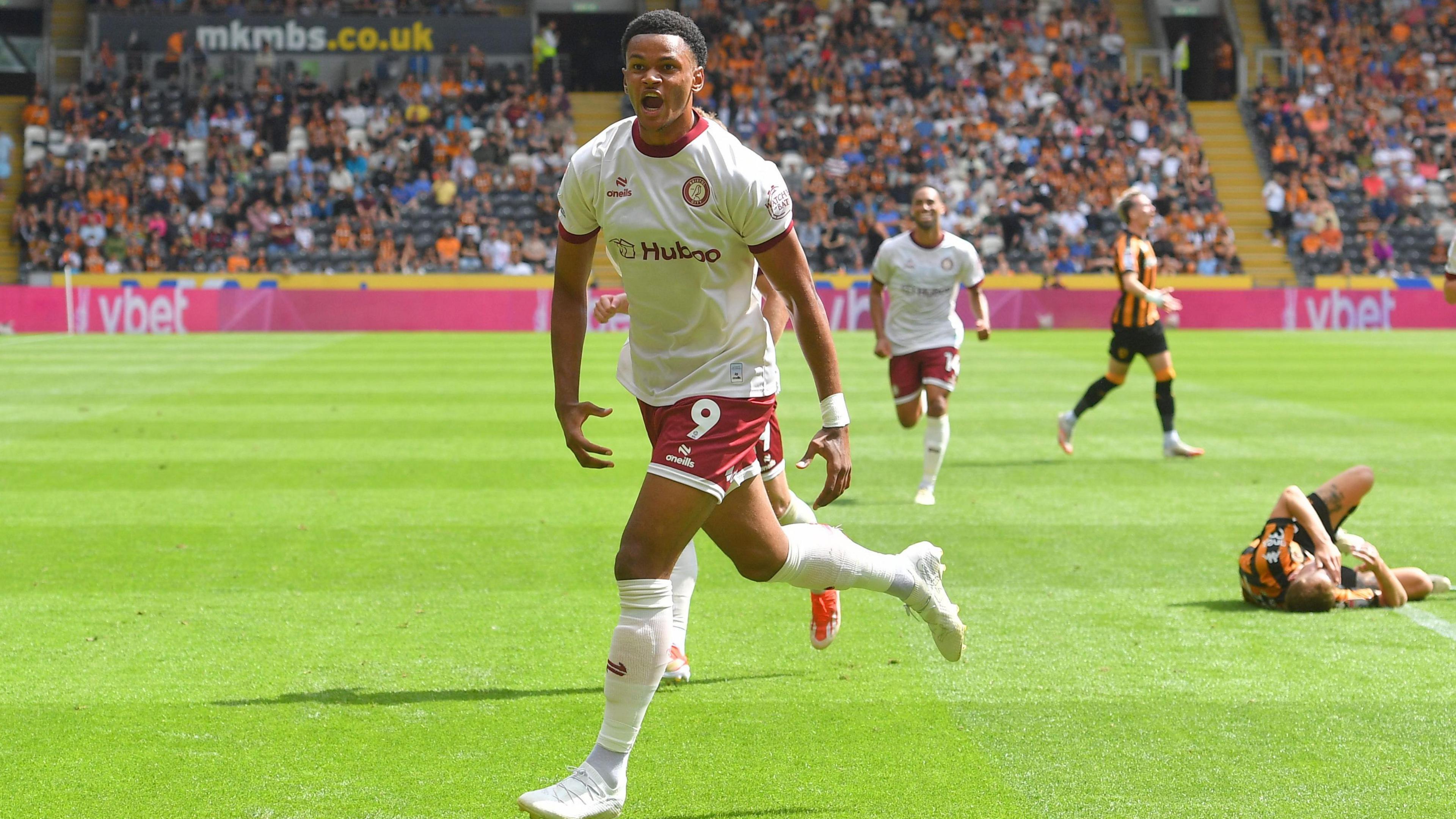 Fally Mayulu celebrates scoring for Bristol City