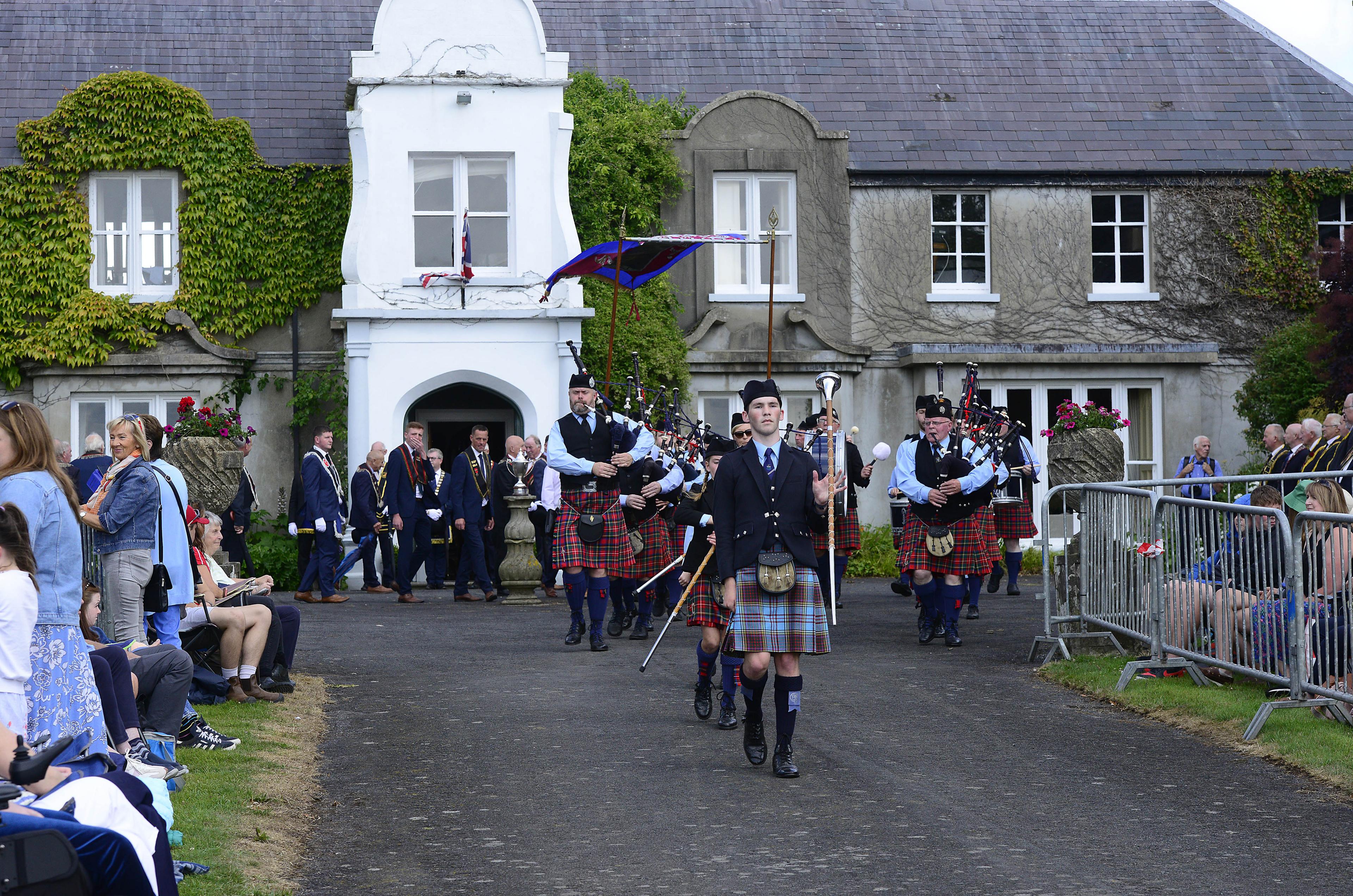 Tens of thousands of visitors converged on the charming Co Down village for the traditional celebrations, which seen a parade of 4,000 members of the Royal Black Institution and around 70 bands.