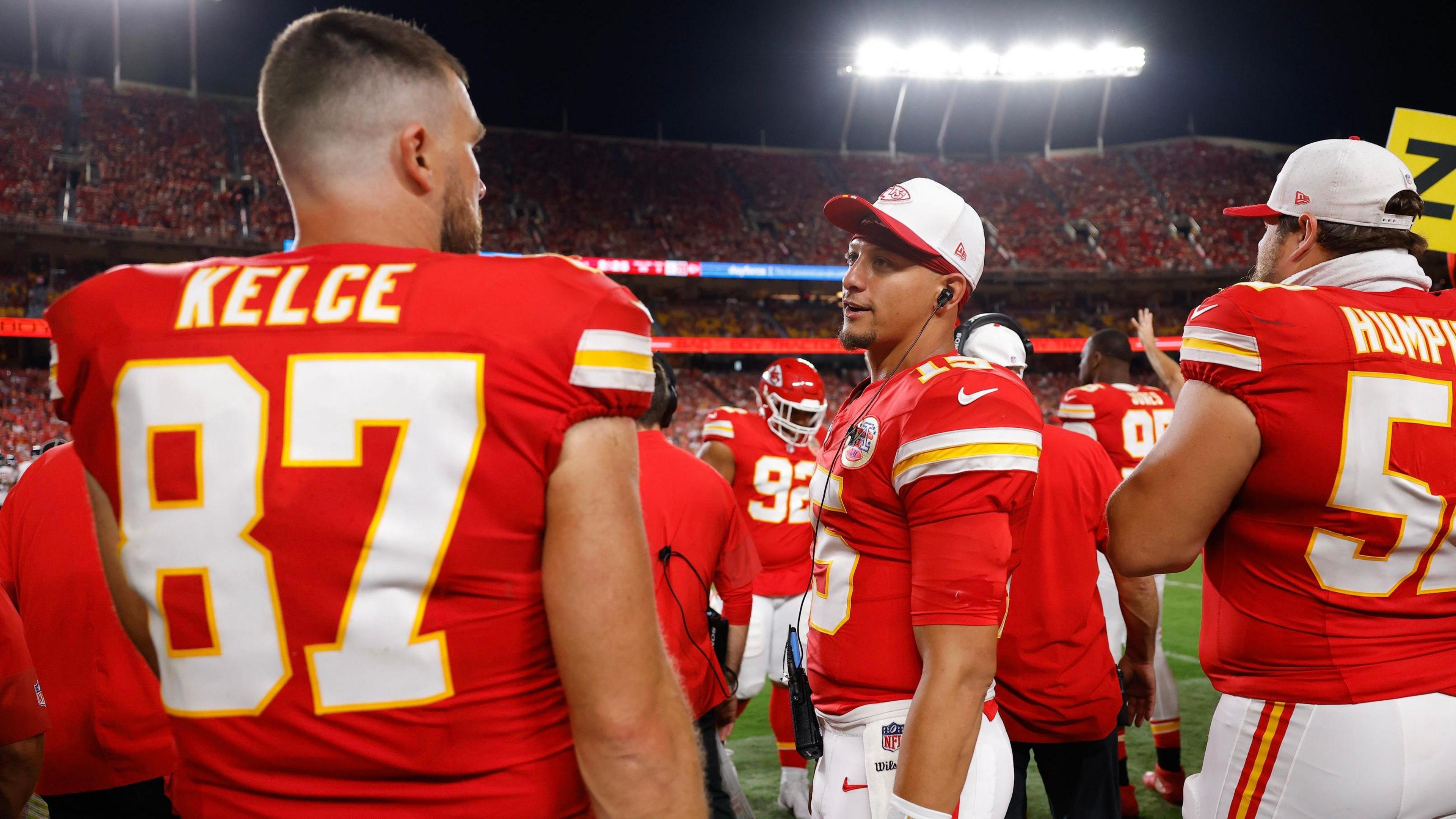 Kansas City Chiefs quarterback Patrick Mahomes talkes to team-mate Travis Kelce