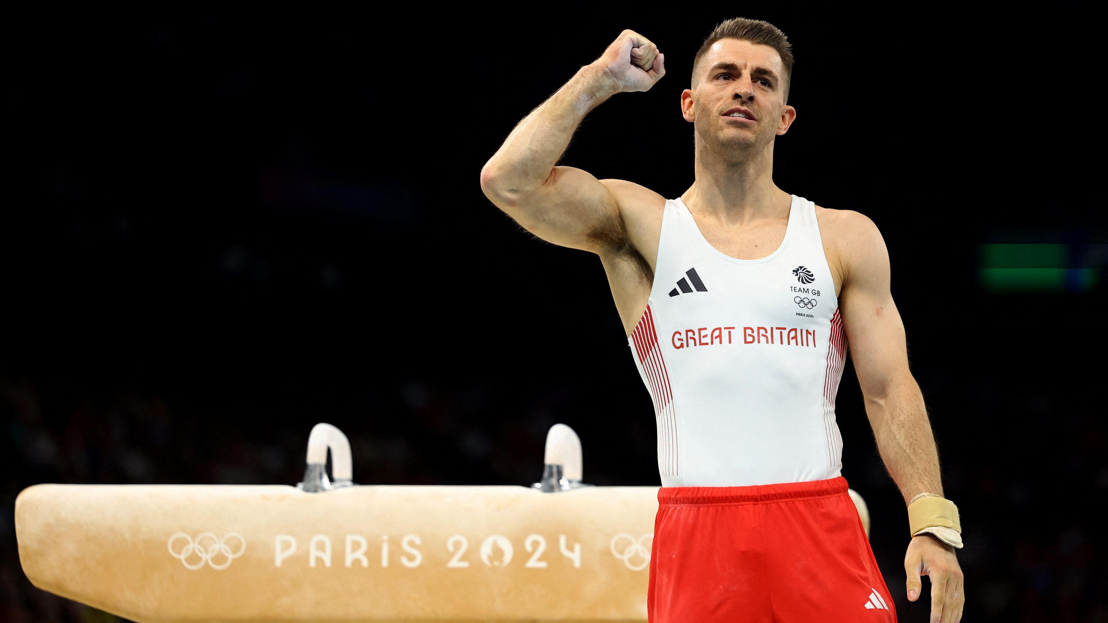 max whitlock celebrating after finishing his pommel horse routine at the paris 2024 olympics