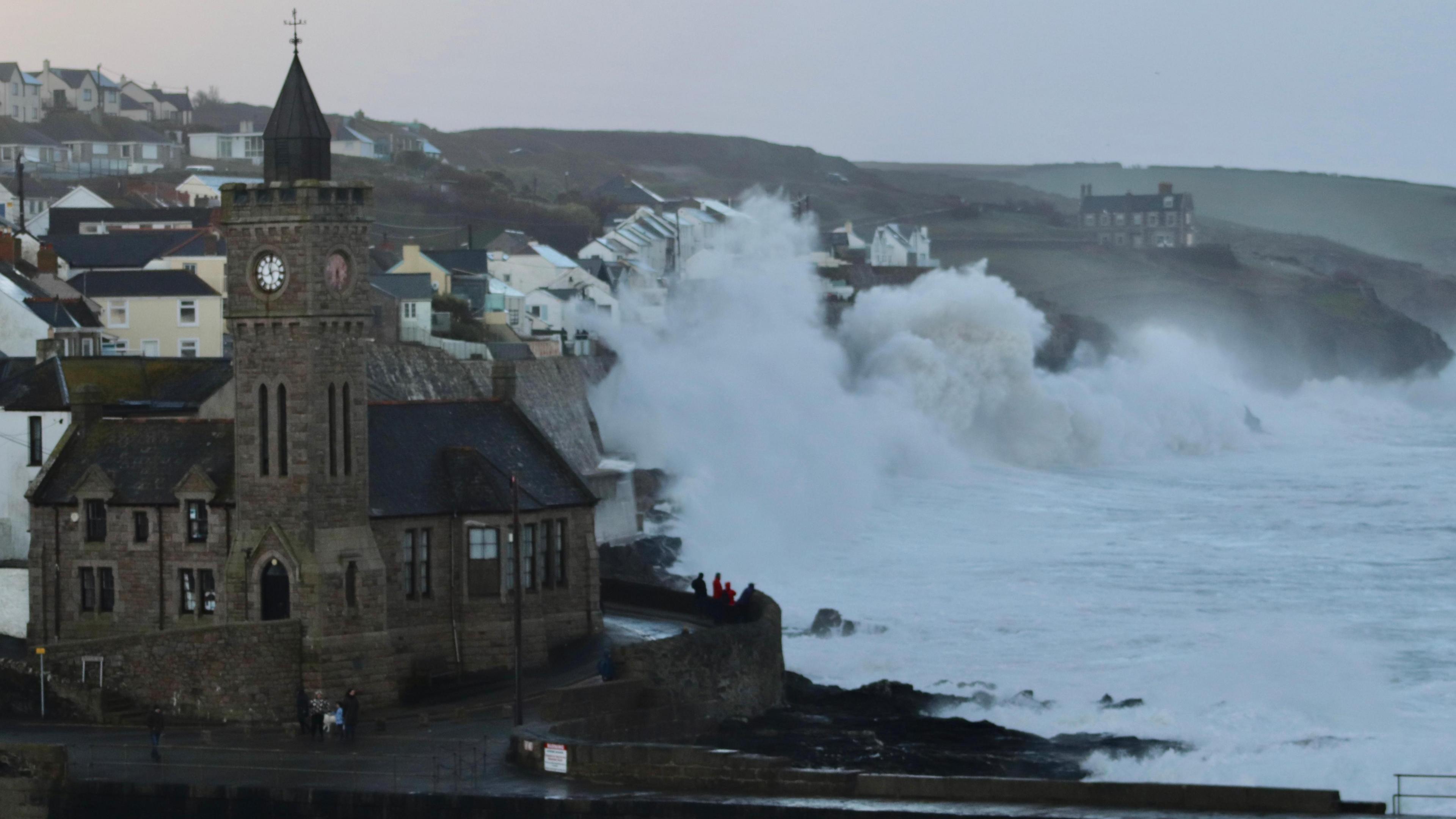 Huge waves crash into the coast of Porthleven during Storm Eunice in 2022.