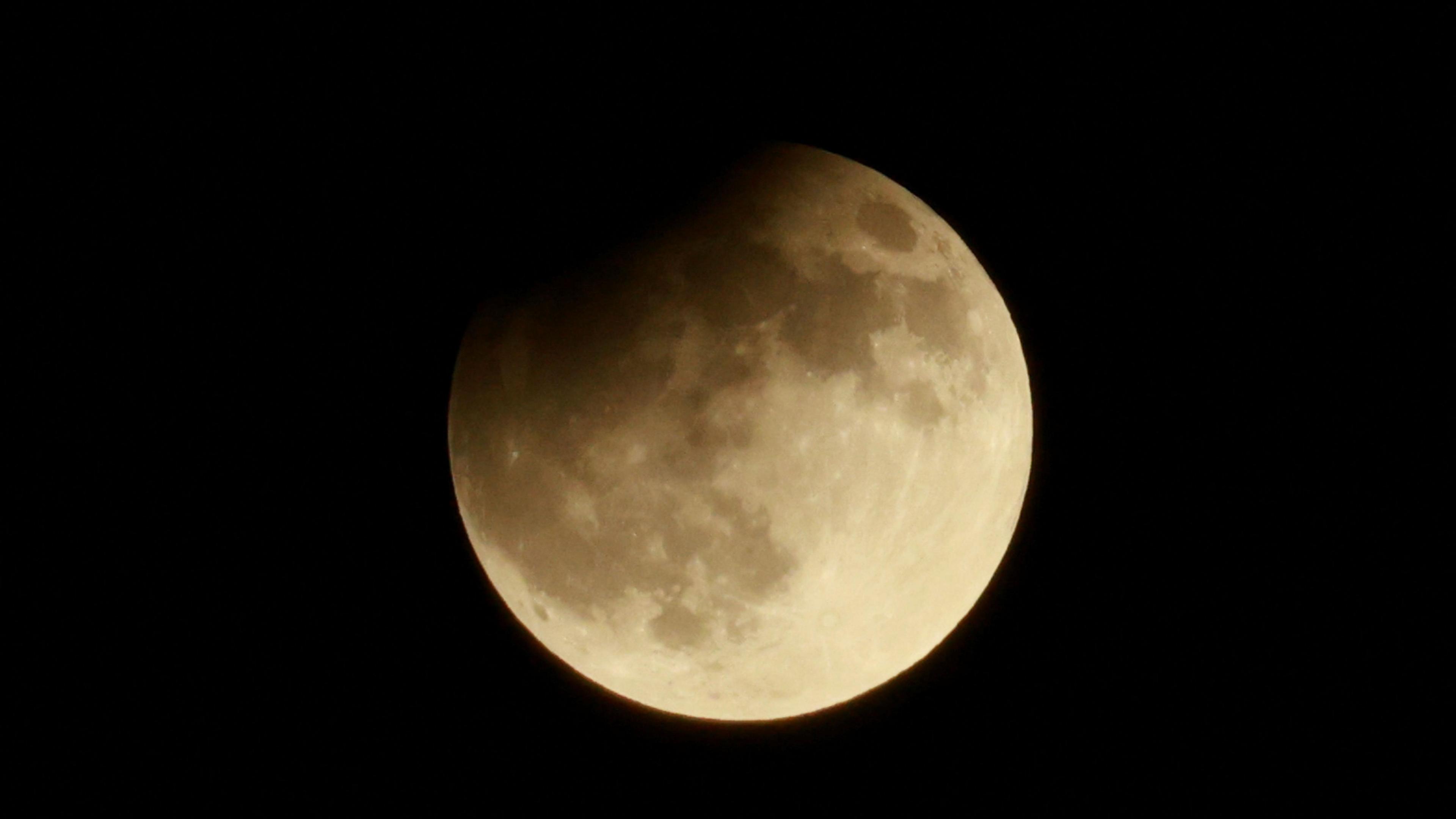 Partial lunar eclipse at the Samalayuca Dunes on the outskirts of Ciudad Juarez, Mexico