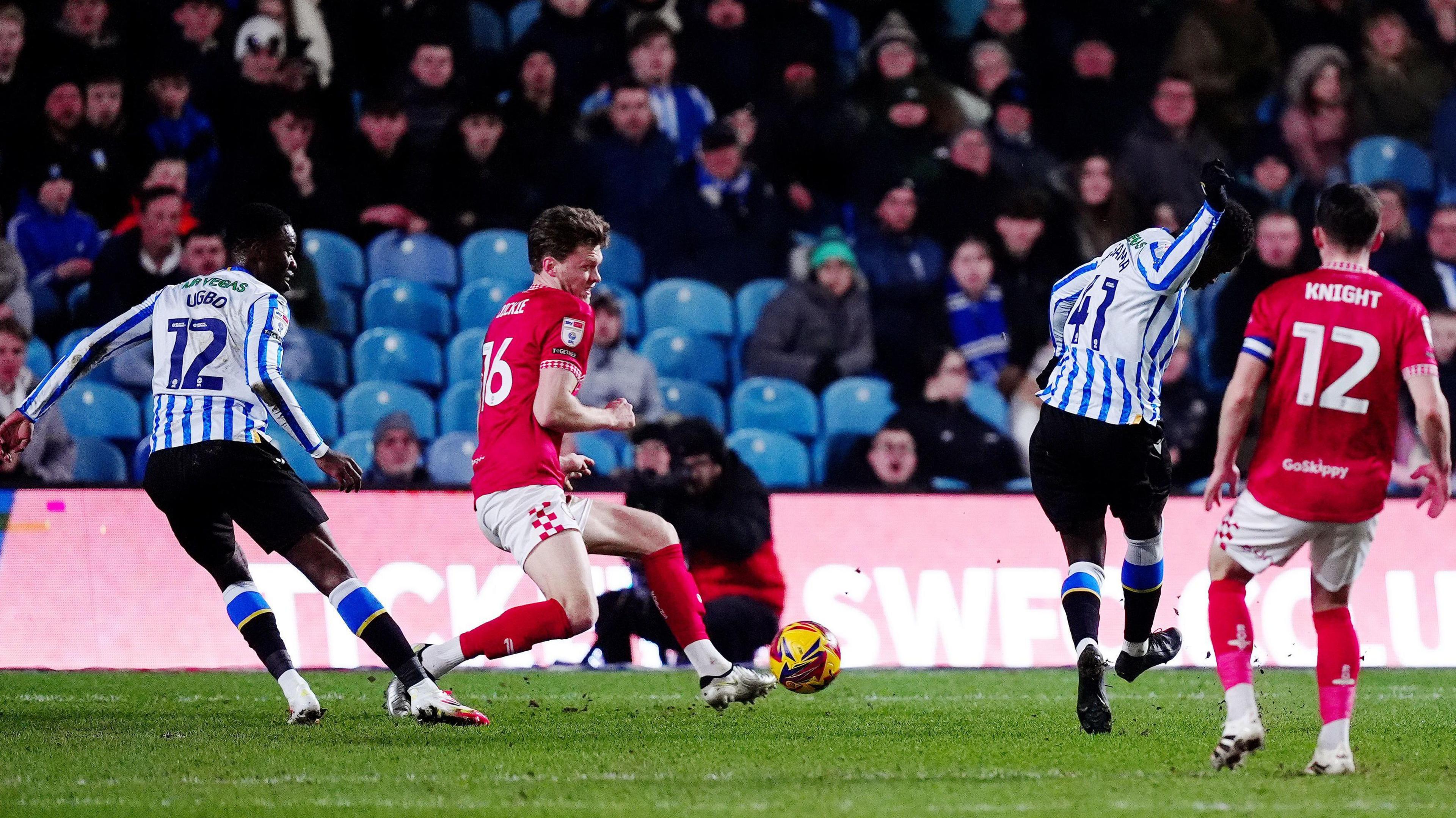 Sheffield Wednesday's Djeidi Gassama (second right) scores