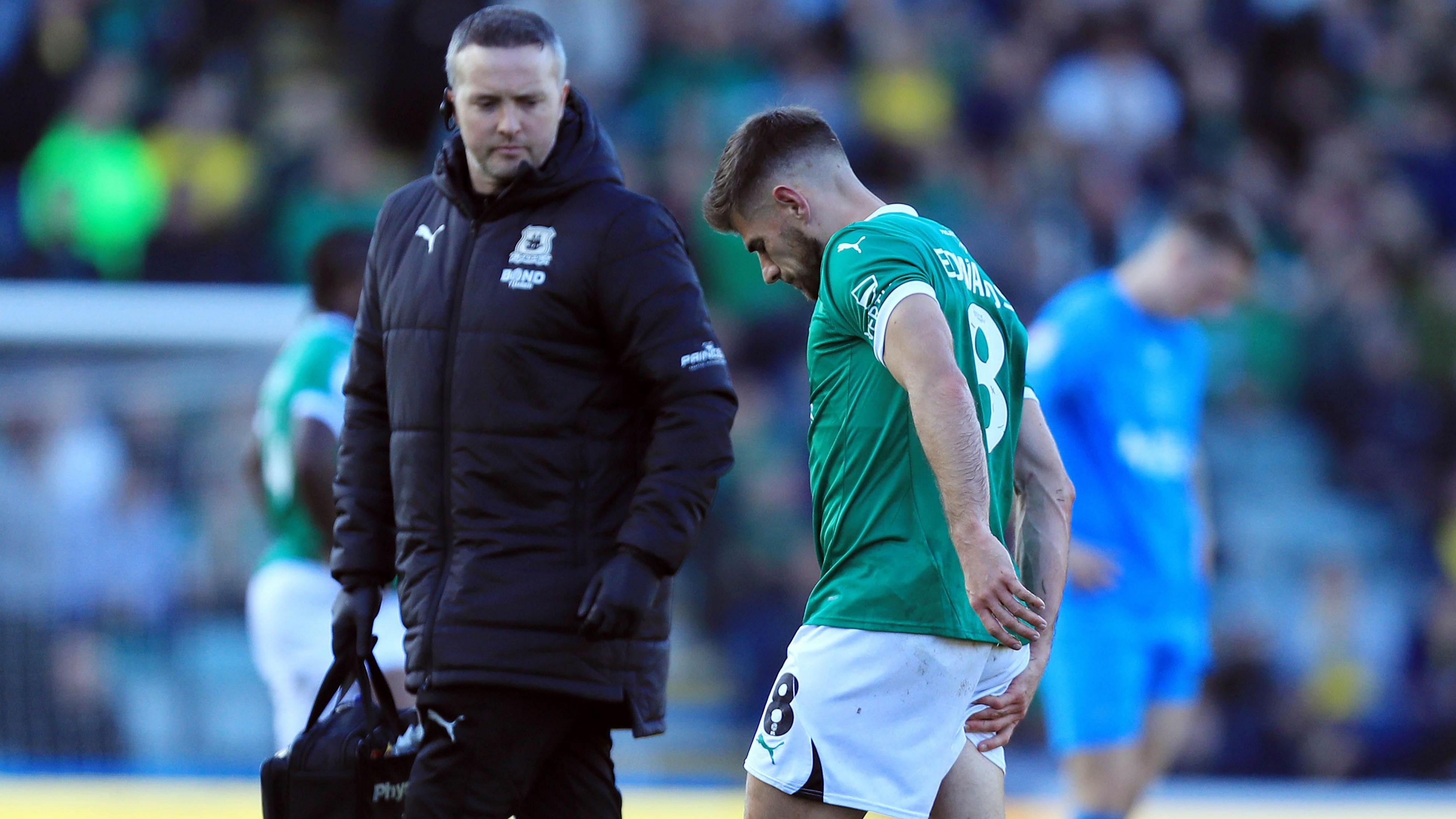 Joe Edwards hold his right hamstring as he limps off during Plymouth's 3-3 draw against Preston North End