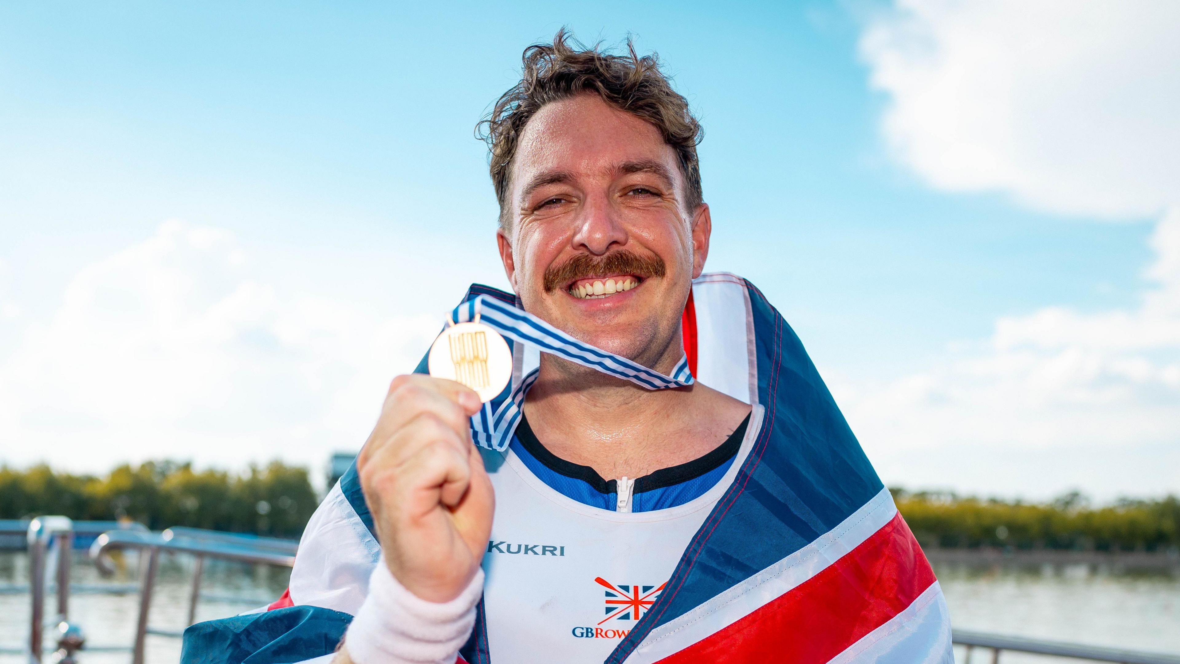 Benjamin Pritchard and his gold medal