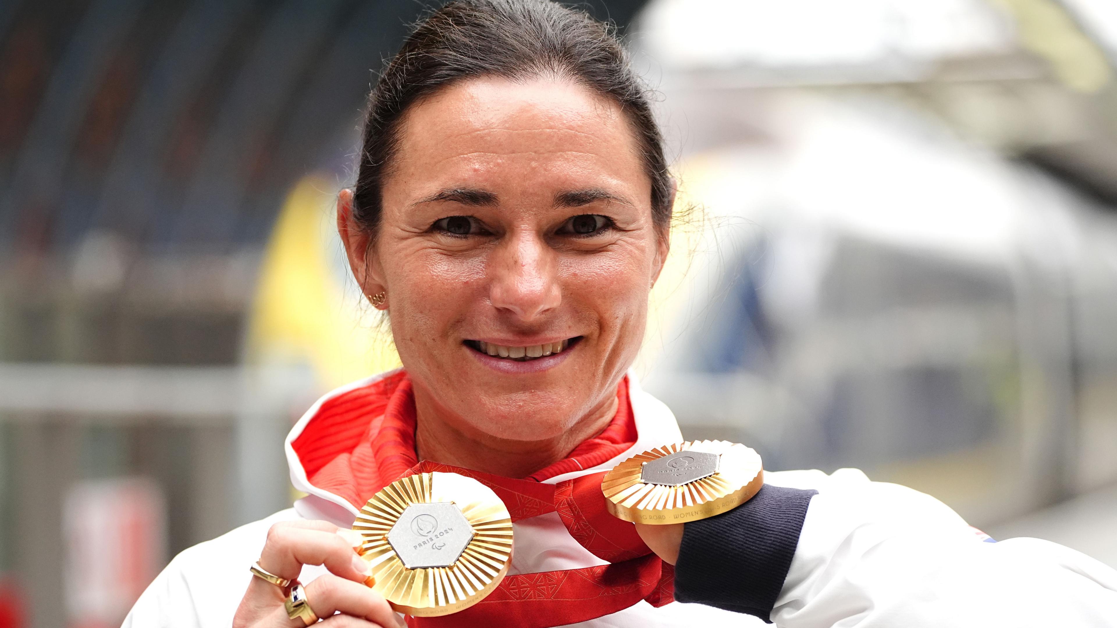 File photo dated 09-09-2024 - A woman with brown hair looking straight at the camera smiling wearing a Team GB hoodie with two gold medals around her neck.