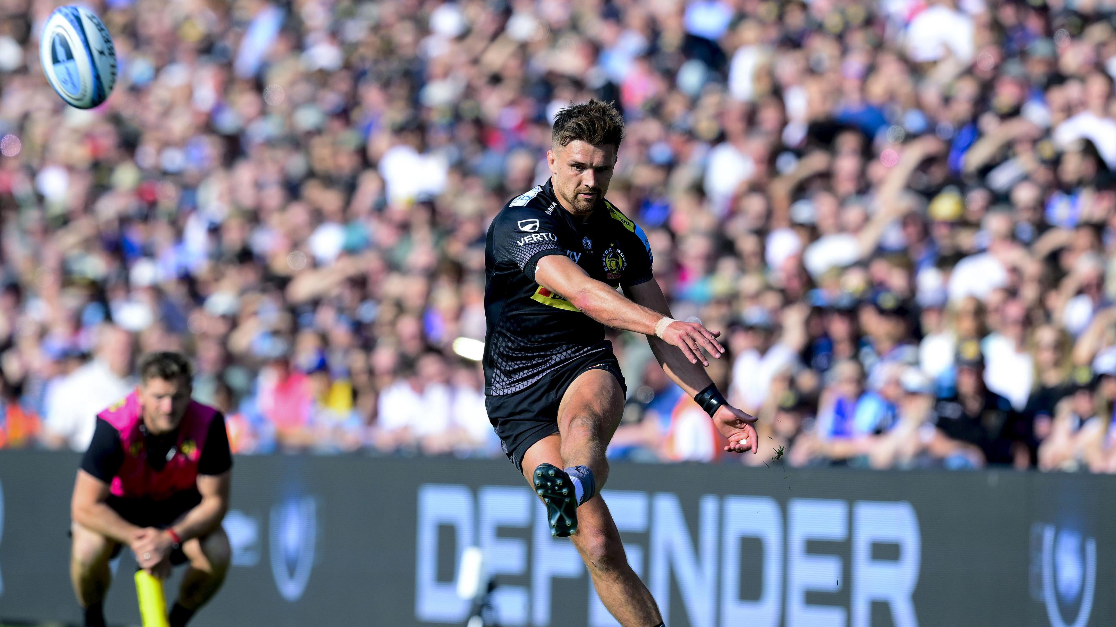 Henry Slade kicks a conversion for Exeter