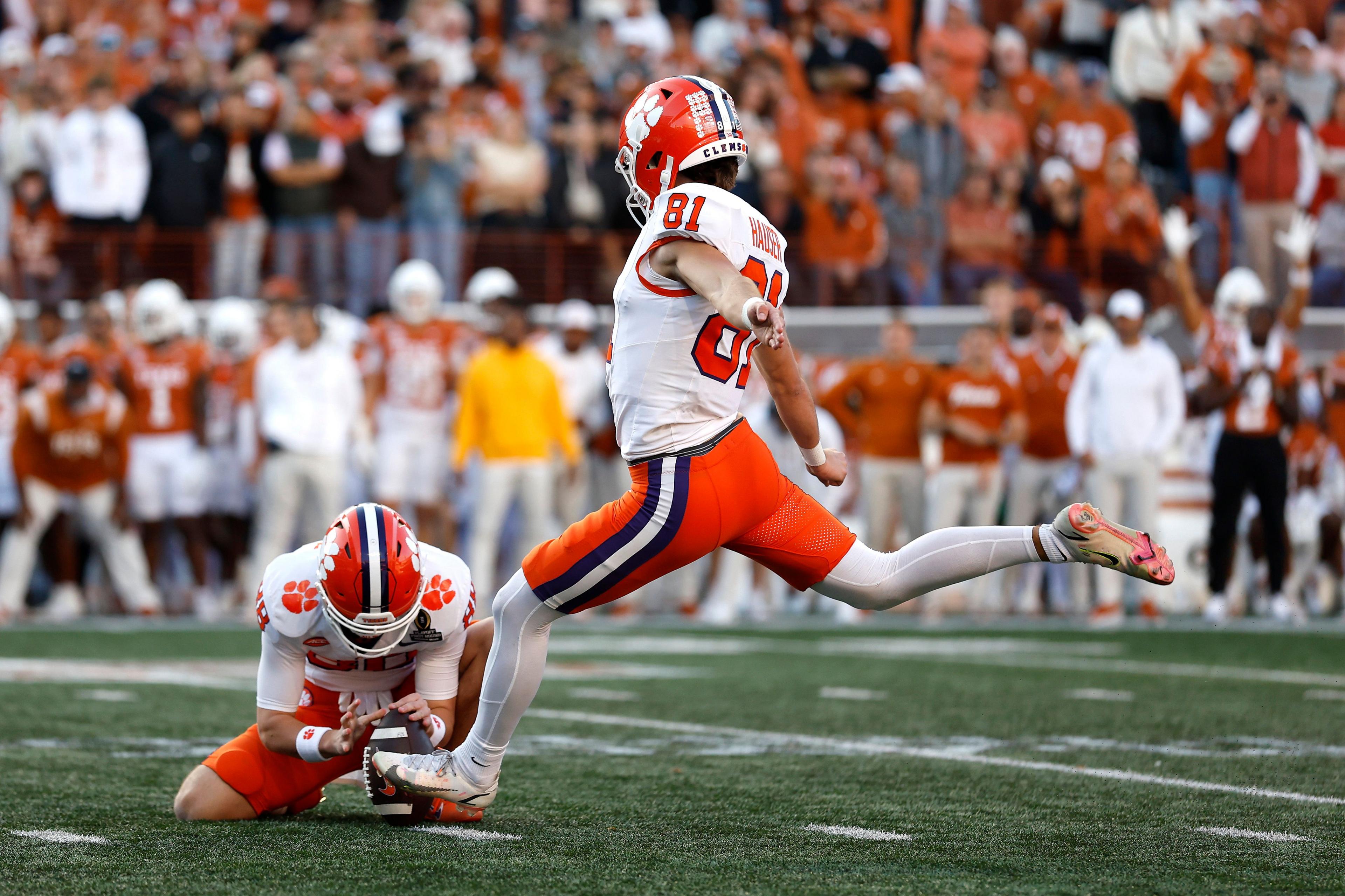 Nolan Hauser of the Clemson Tigers kicks a field goal during the second quarter against the Texas Longhorns in the Playoff First Round Game at Darrell K Royal-Texas Memorial Stadium in Austin, Texas