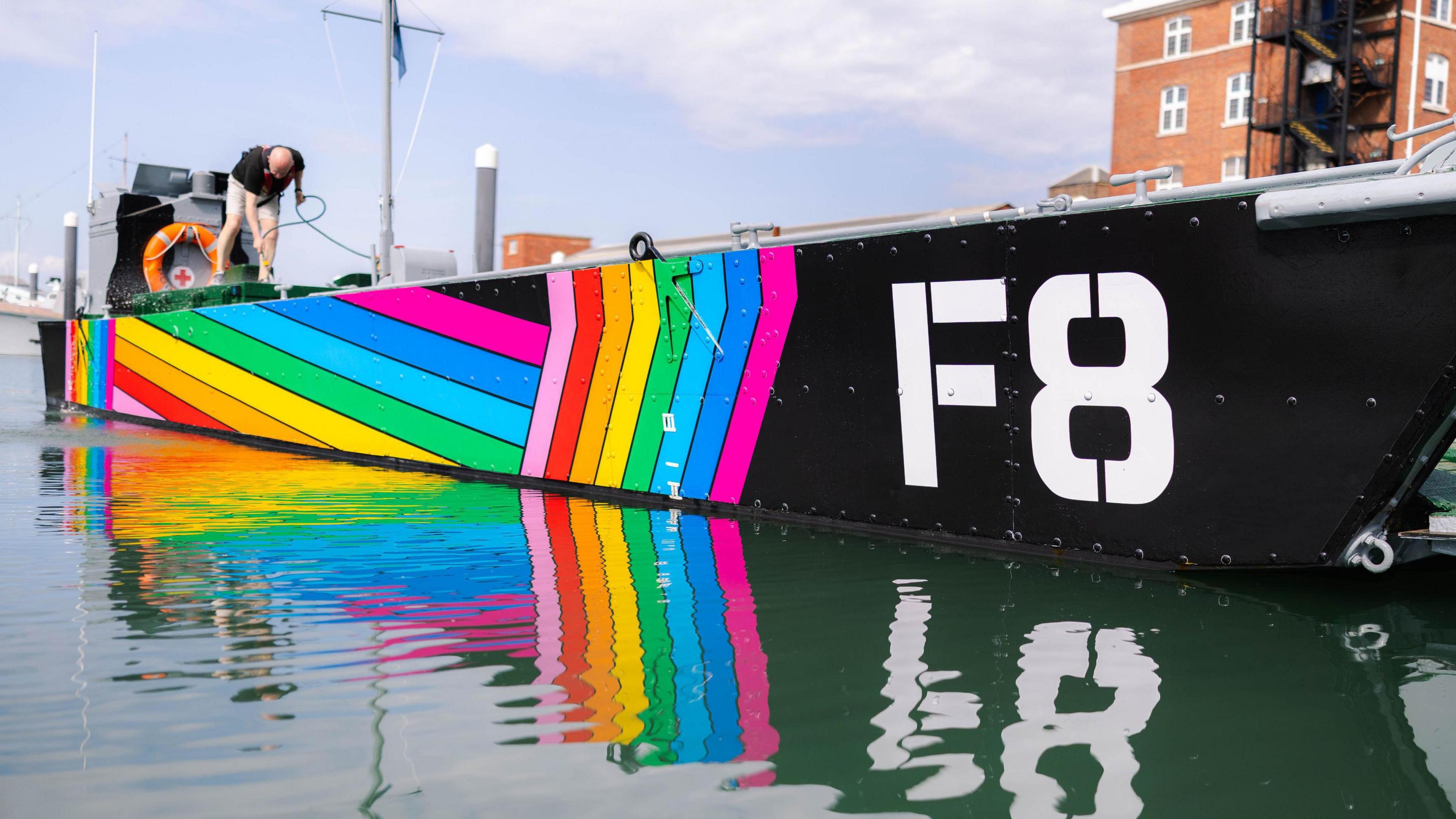 Royal Navy Landing Craft Foxtrot 8 which was used in the Falklands War wrapped in Pride colours to mark the 25th anniversary of the lifting of the ban on gay people serving in the UK armed forces
