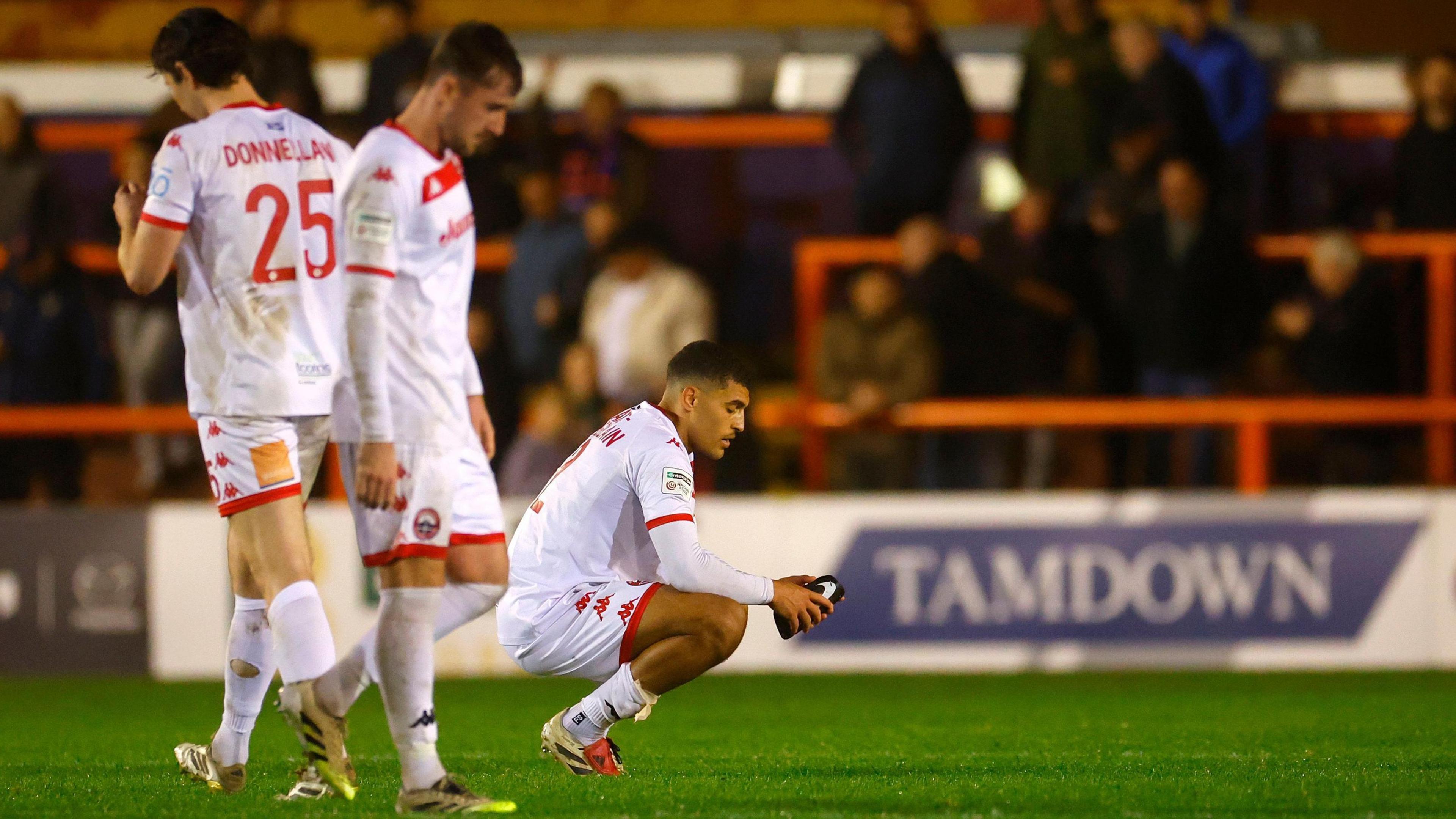 Dejected Truro City players