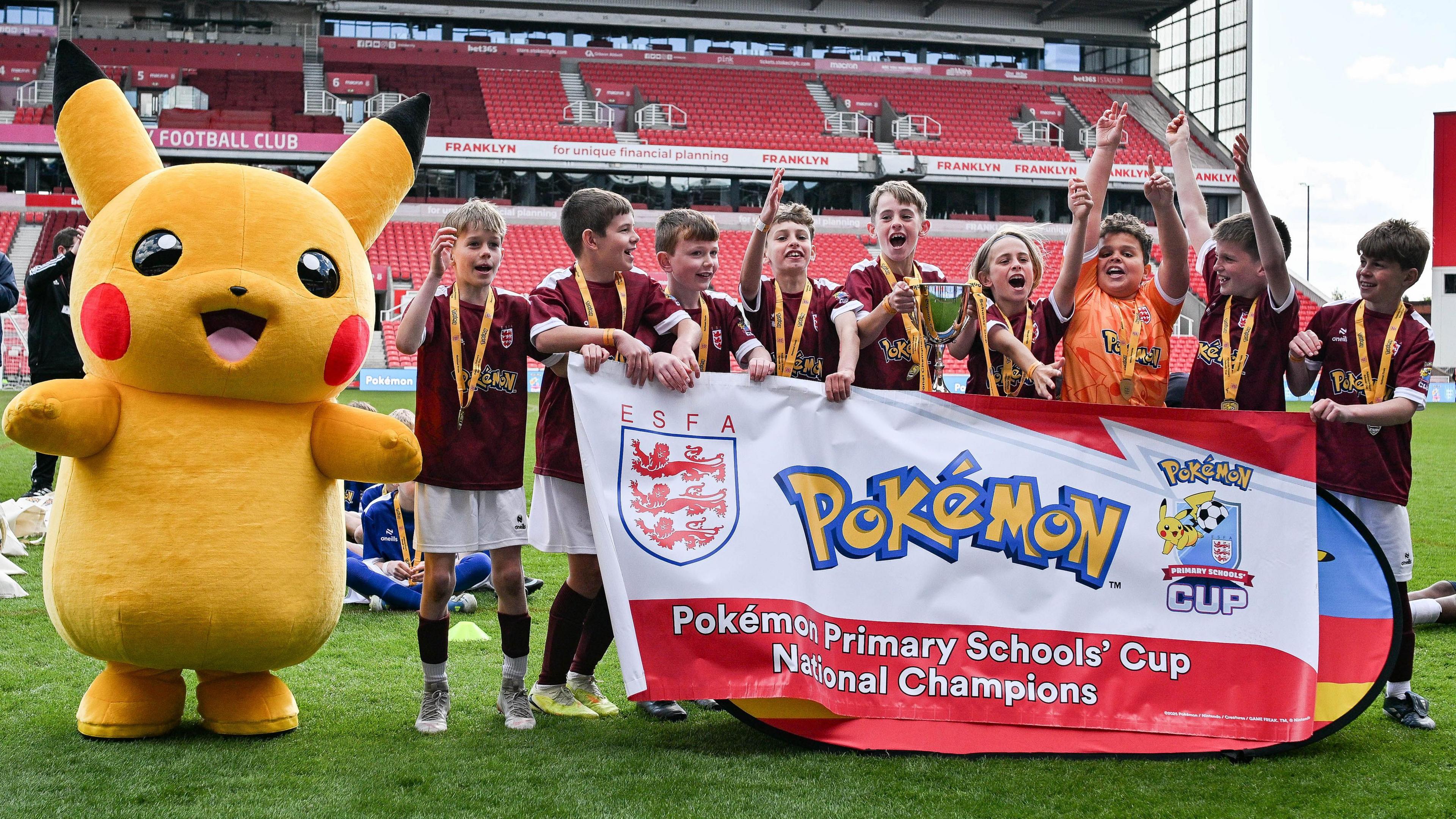 Corpus Christi Catholic Primary Academy lifting the U11 Schools Cup.