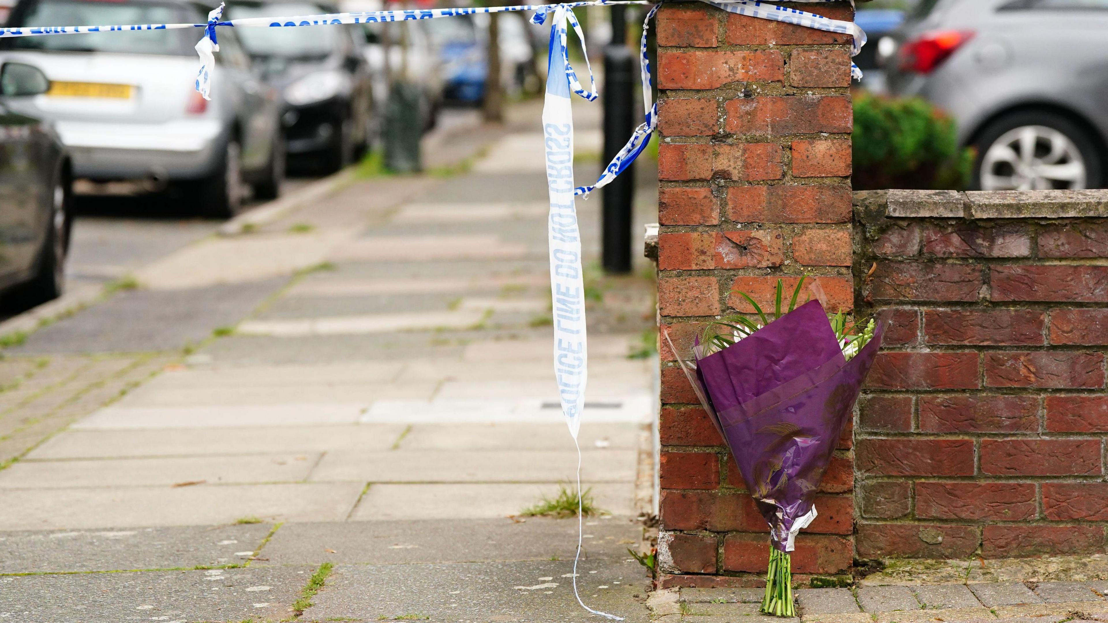 Flowers left at the police cordon