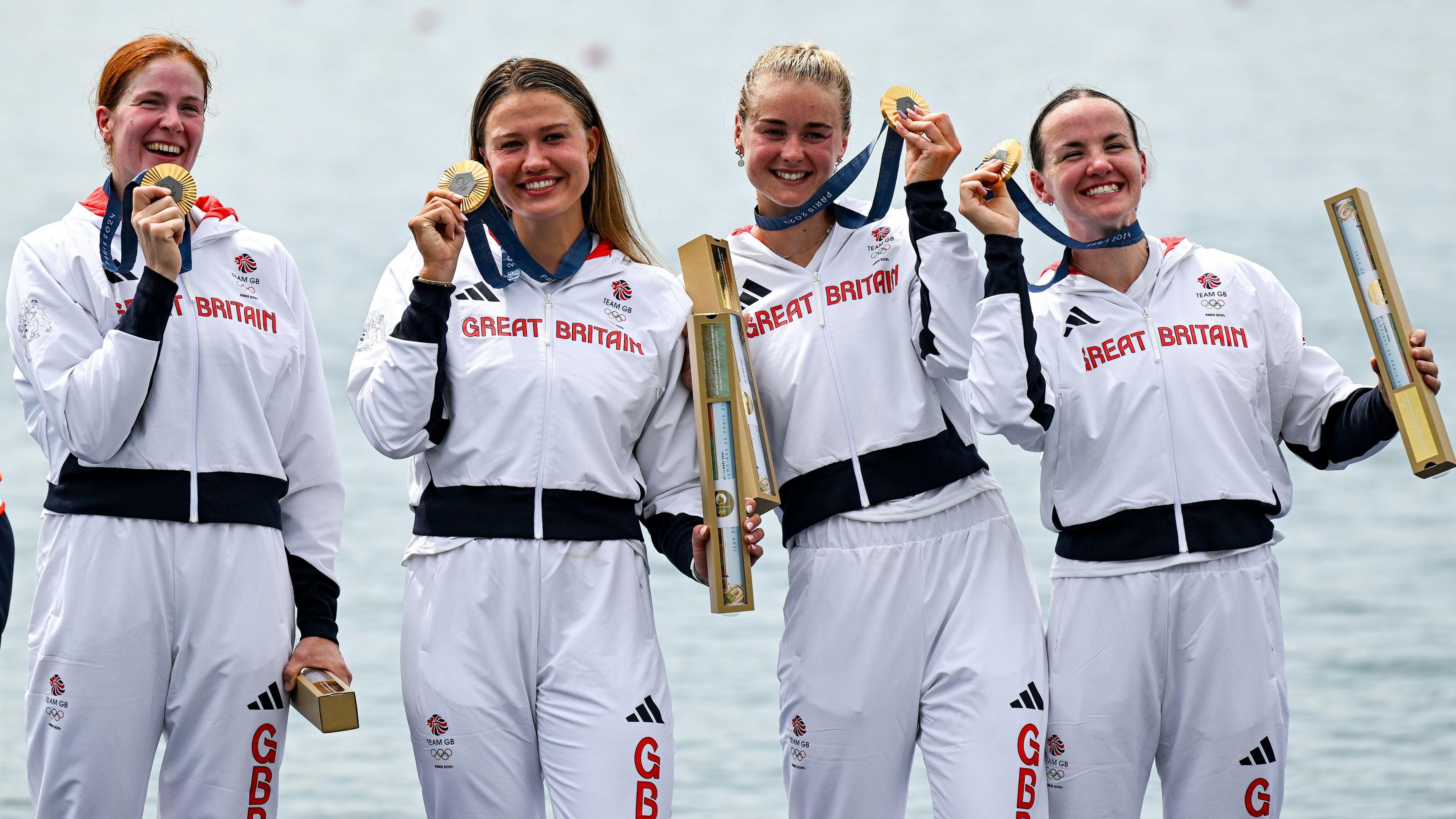 Team GB rowers (l to r) Georgina Brayshaw, Lola Anderson, Hannah Scott and Lauren Henry pose with their Olympic gold medals