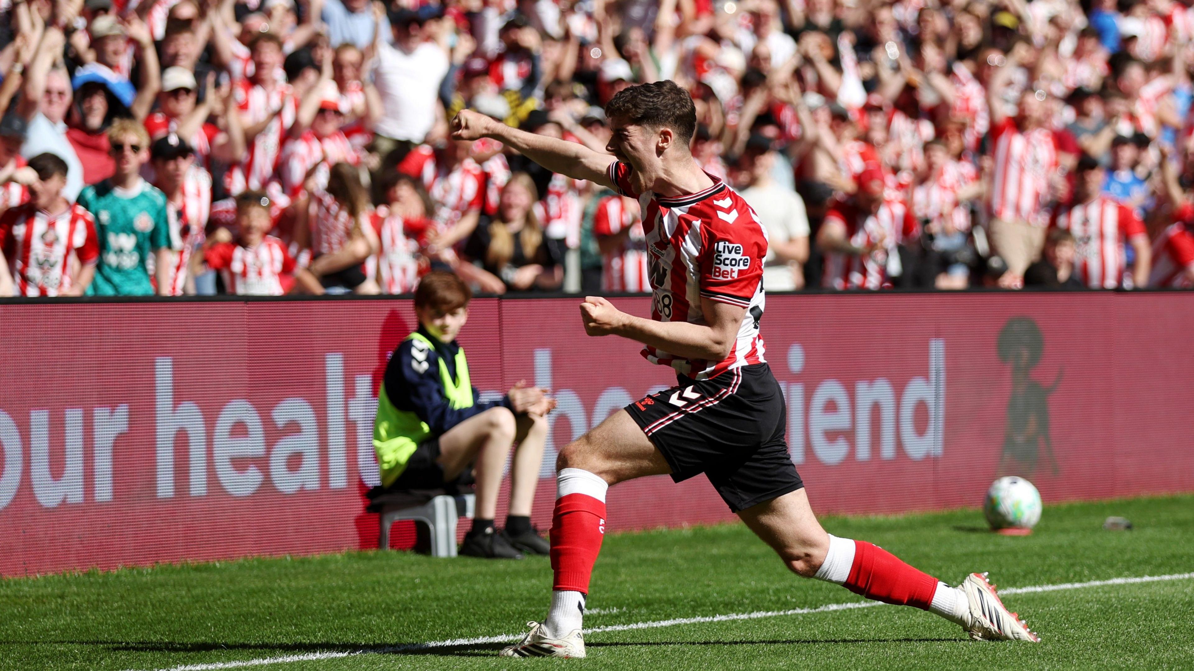 Trai Hume of Sunderland celebrates scoring his team's first goal against Chelsea