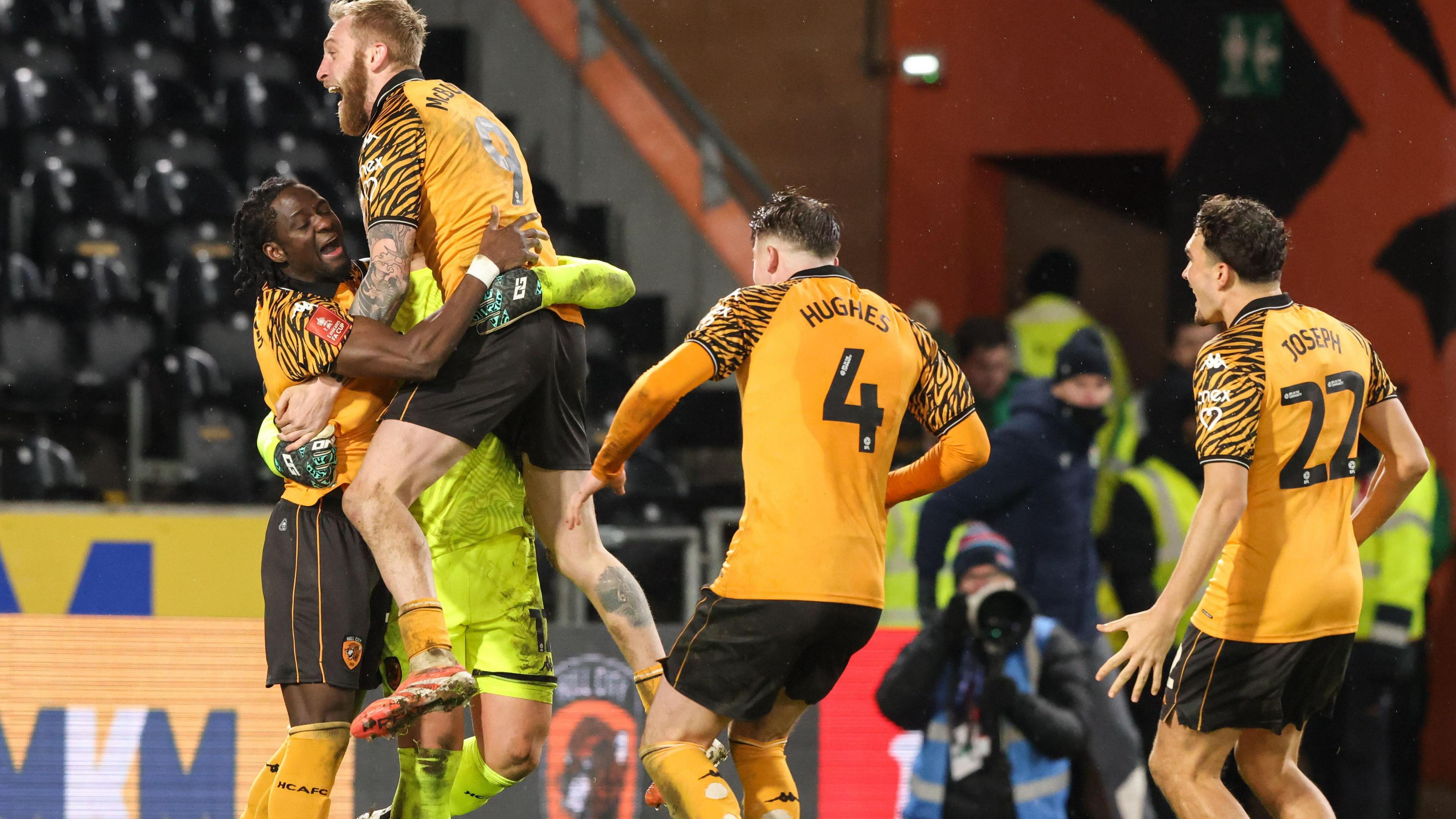 Hull City players celebrate their penalty shootout win over Blackburn Rovers in the third round of the FA Cup