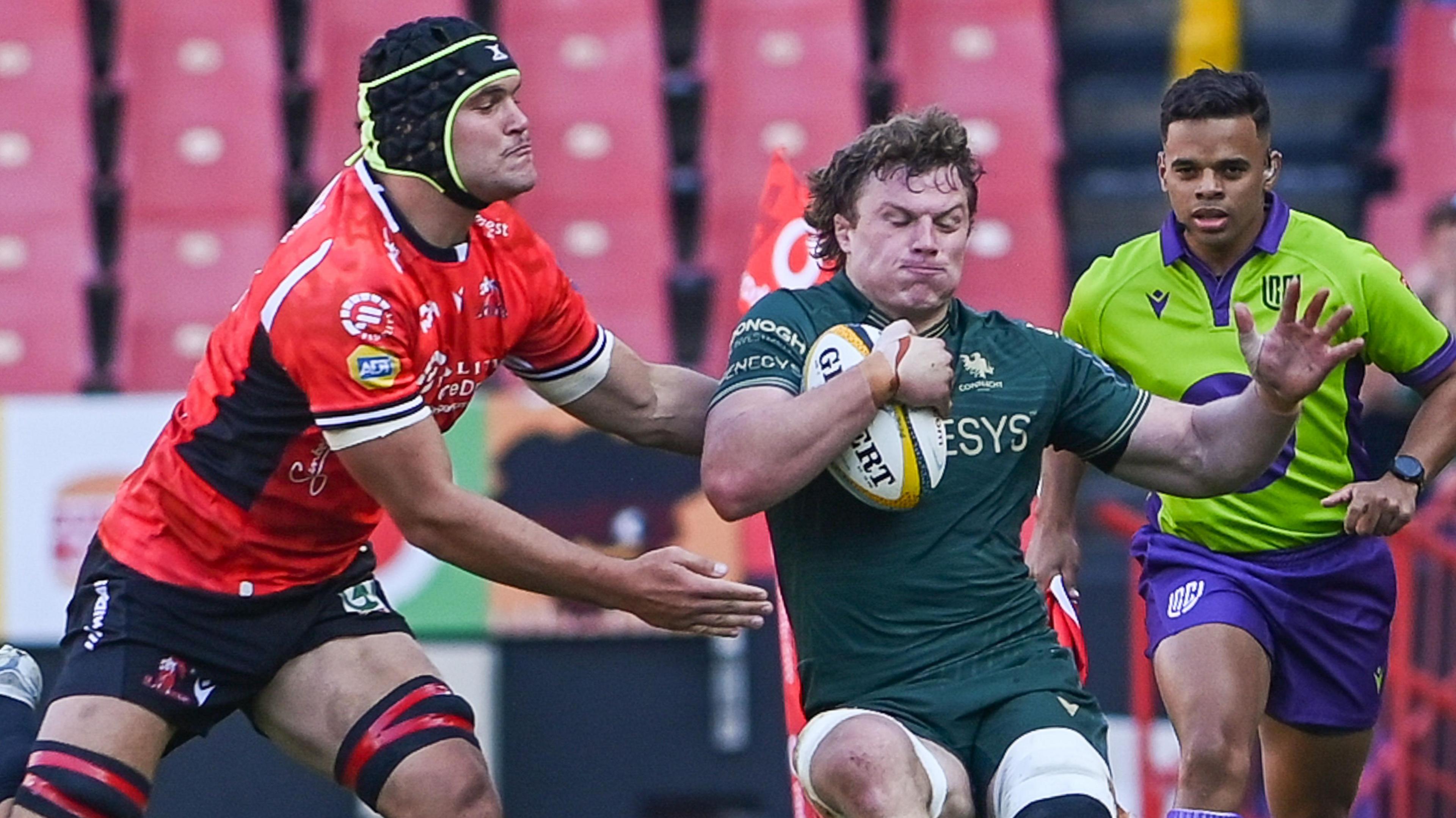 Cian Prendergast is tackled by Ruan Venter