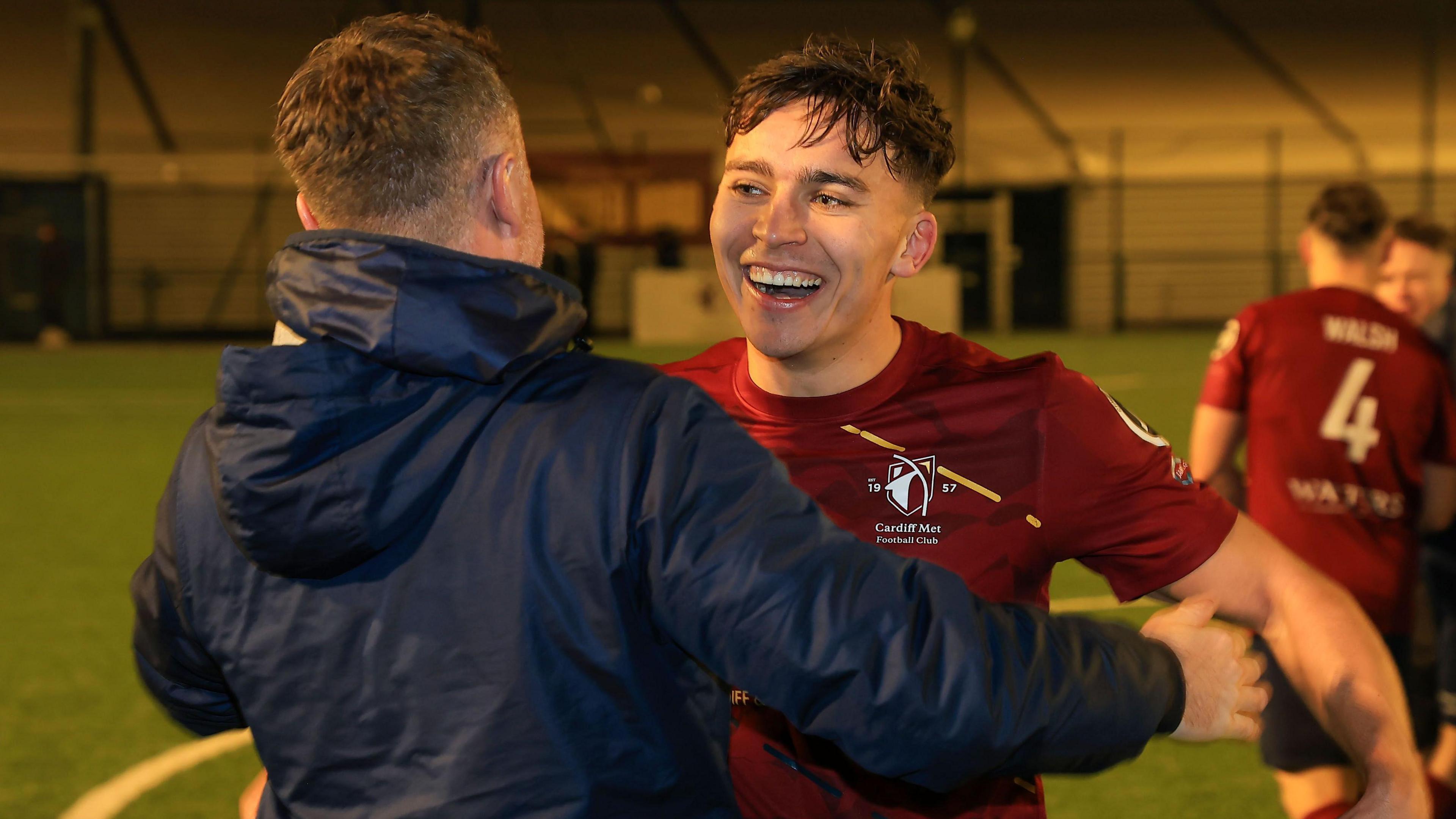 Cardiff Met players and officials celebrate their win over The New Saints