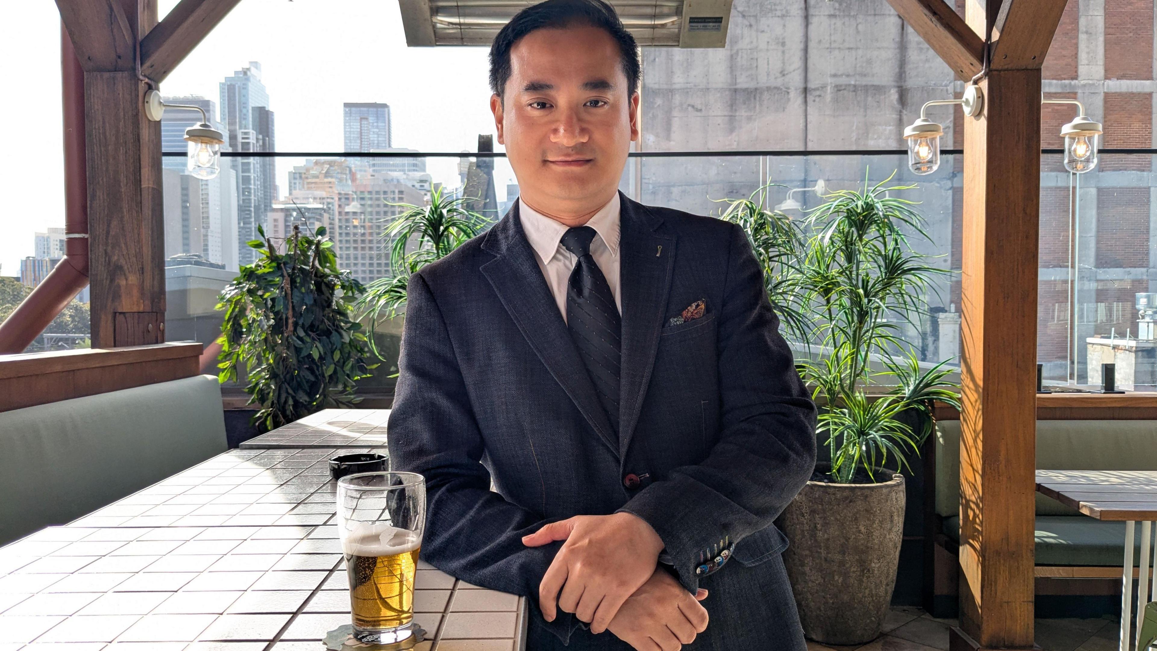 Henry Luo at a bar in Sydney central