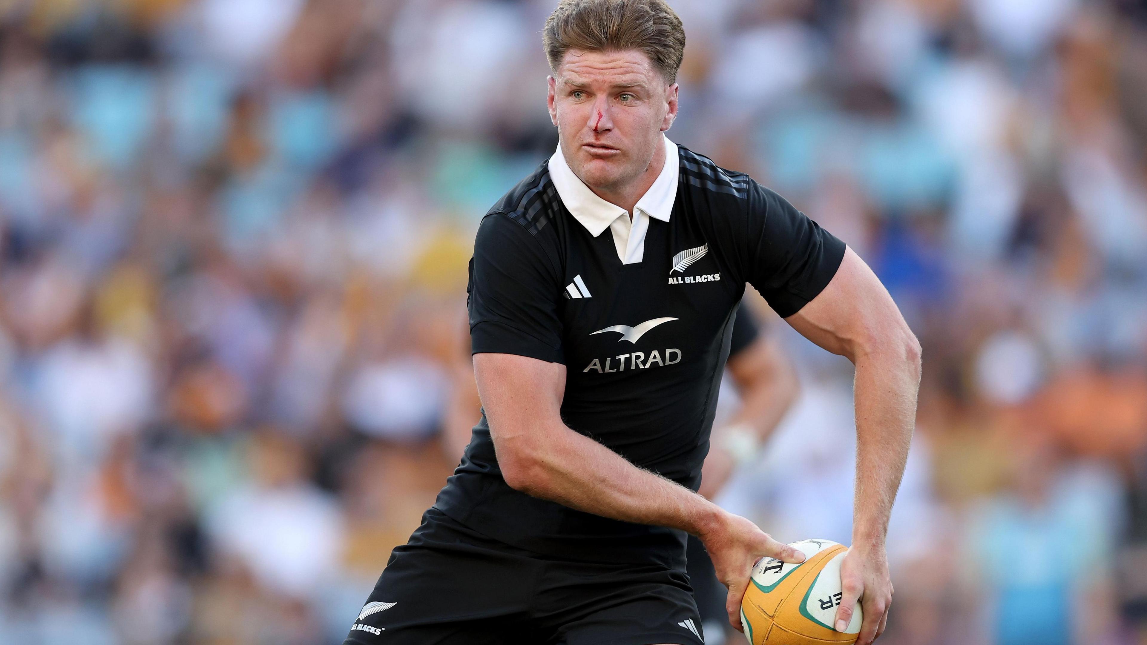 Jordie Barrett playing for the All Blacks with a bloodied nose