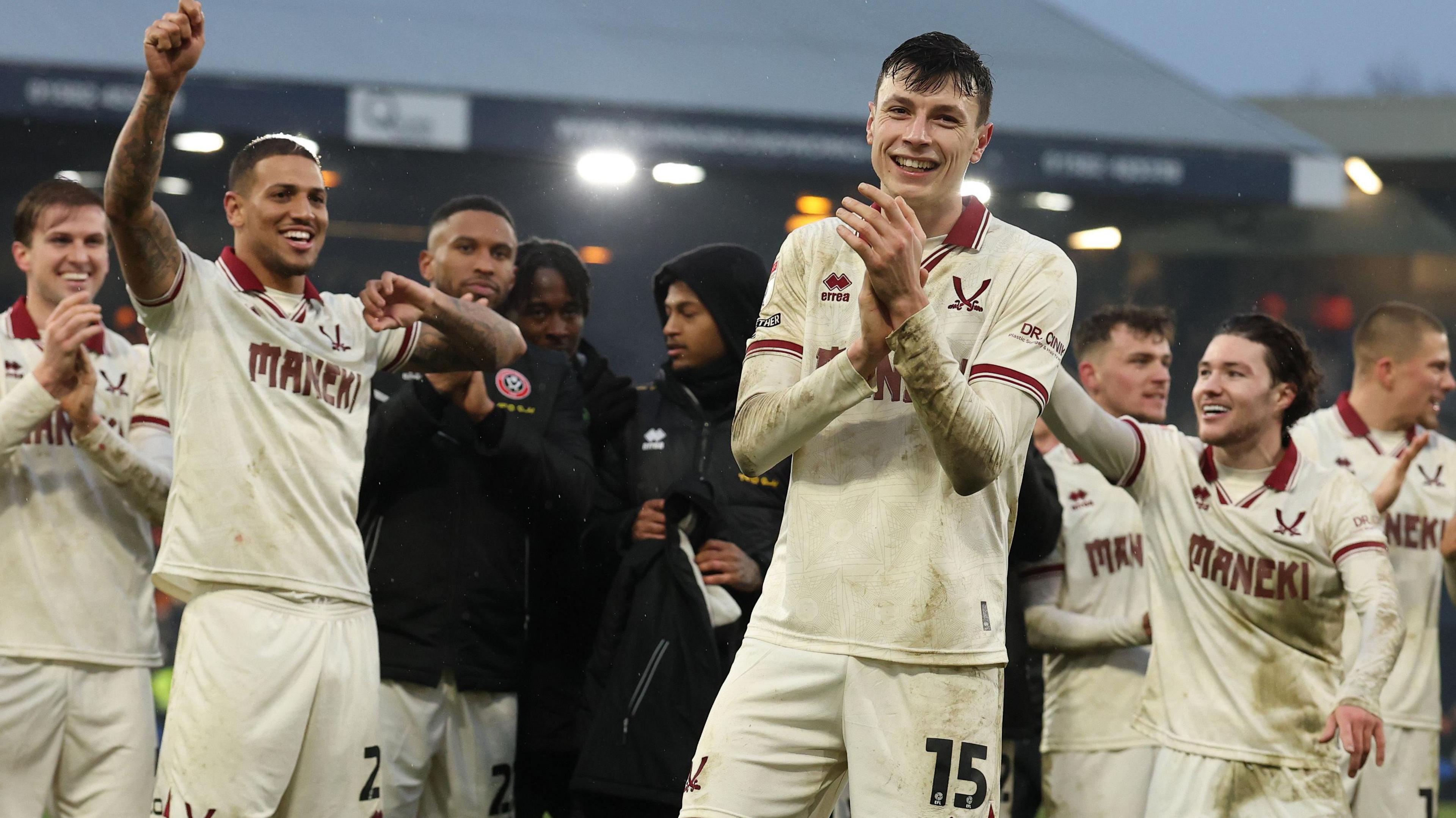 Anel Ahmedhodzic celebrates Sheffield United's win at Luton with his team-mates