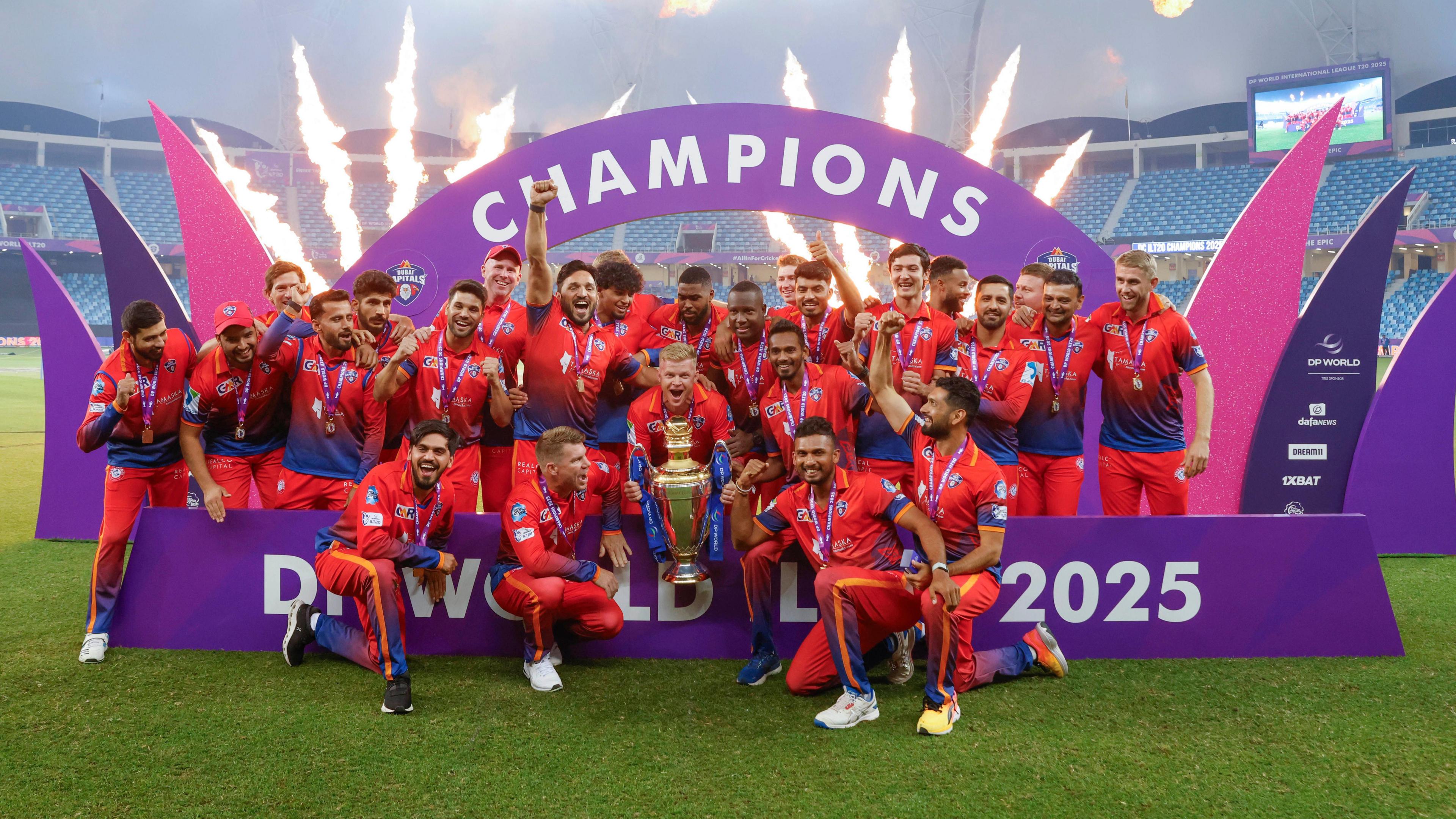 Dubai Capitals celebrate winning the International League T20