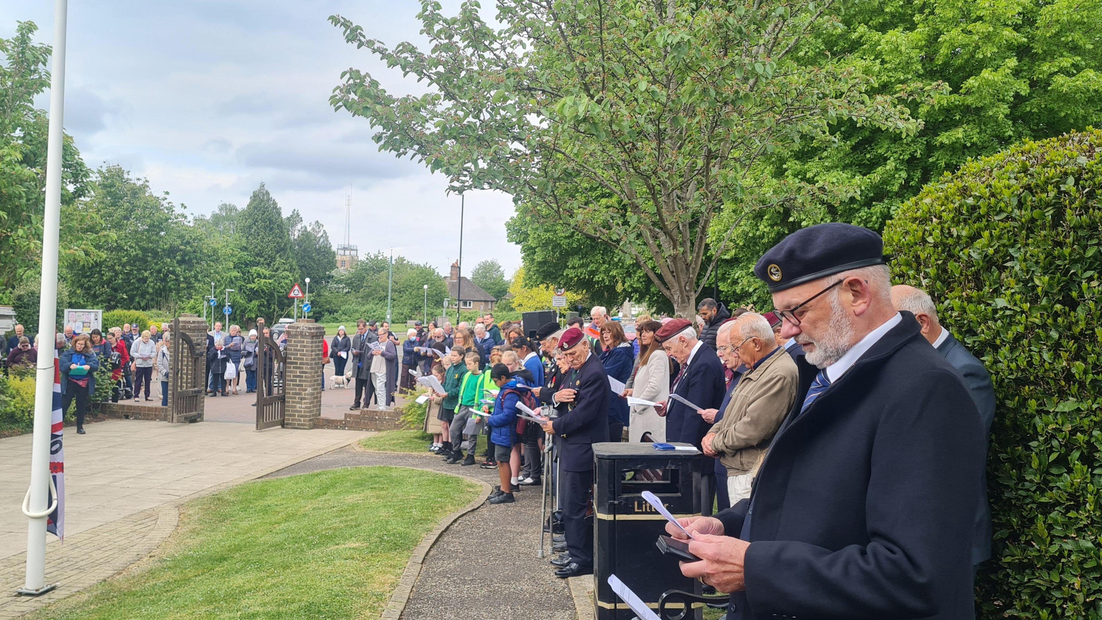 Crowds of people gather in Burgess Hill to commemorate VE Day.