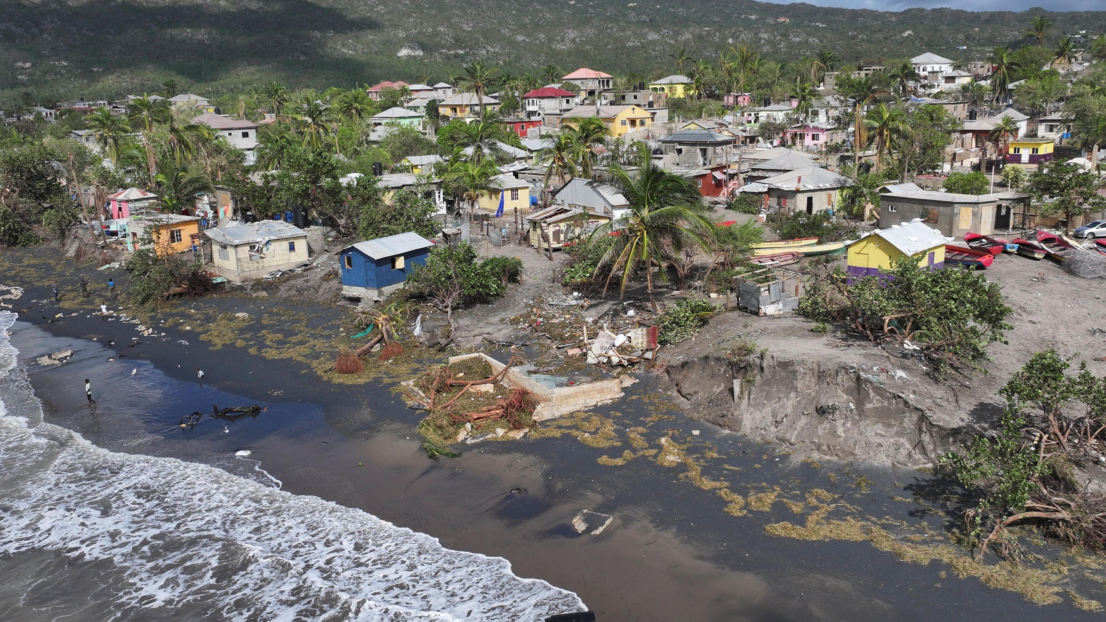 Drone view of damage to coastal homes after Hurricane Melissa in Alligator Pond, Jamaica.